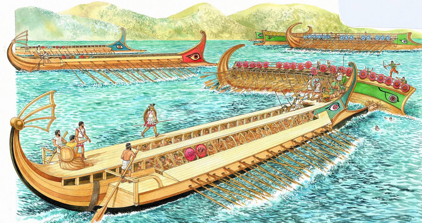 Triremes in battle. There was only a handful of armed men on deck. Most of the casualties happened when Triremes, shattered by the rams of the enemy, spilled their men into the water. They either drowned, or were speared by enemy marines. <em>Brown Bear/Windmil Books/Universal Images Group via Getty Images</em>