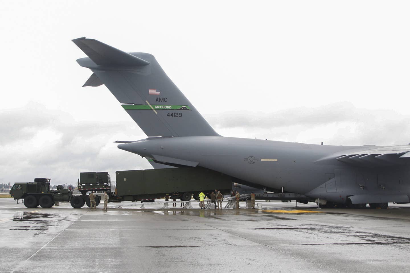 A Typhon launcher is loaded onto a C-17A at Joint Base Lewis-McChord for its trip to the Philippines. <em>US Army</em>