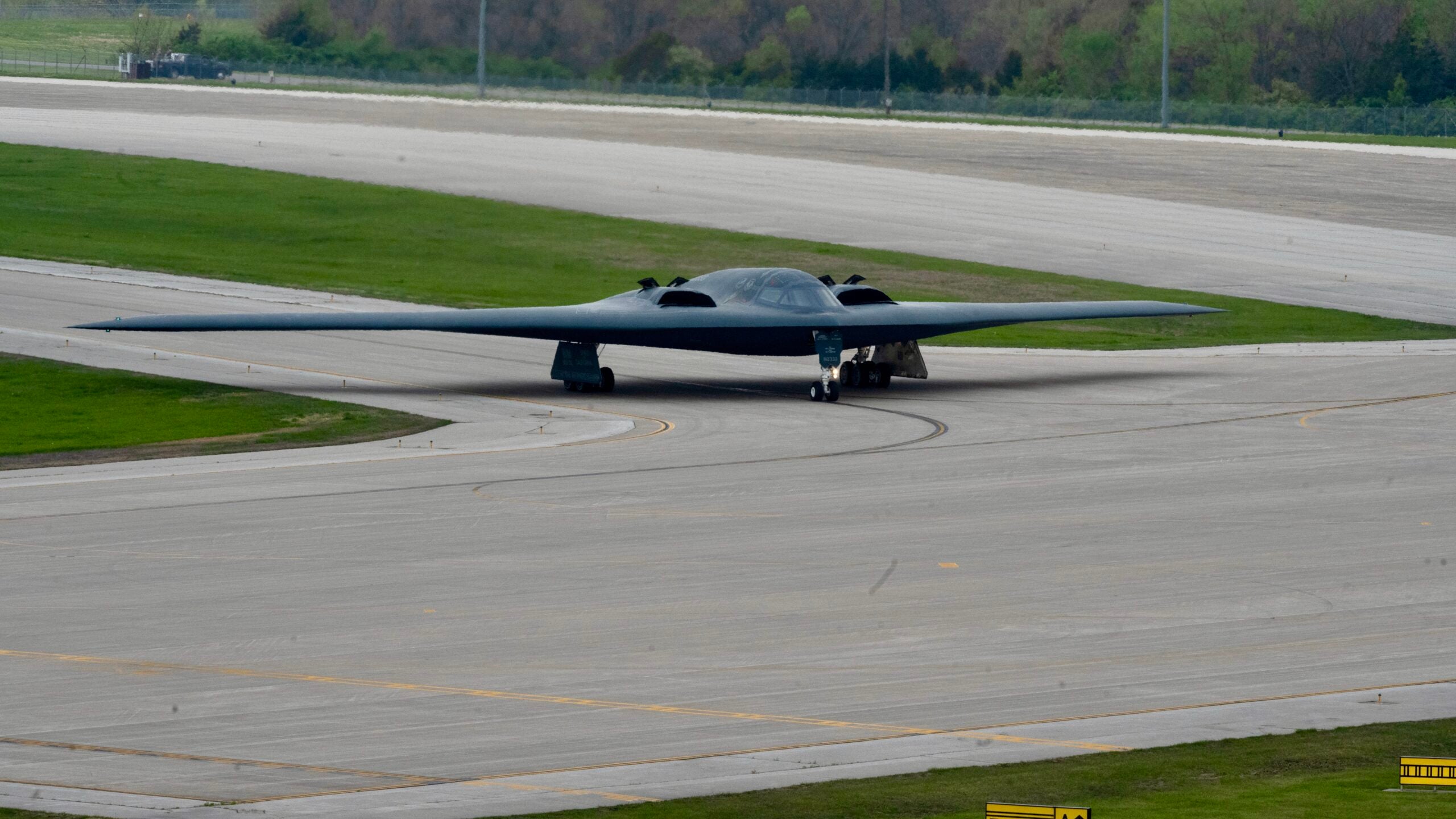 A B-2 Spirit stealth bomber assigned to the 509th Bomb Wing taxis to the runway at Whiteman Air Force Base, Missouri, April 15, 2024. Team Whiteman executed a mass fly-off of 12 B-2s to cap off the annual Spirit Vigilance exercise. Routine training ensures that Airmen are always ready to execute global strike operations… anytime, anywhere. (U.S. Air Force photo by Airman 1st Class Hailey Farrell)