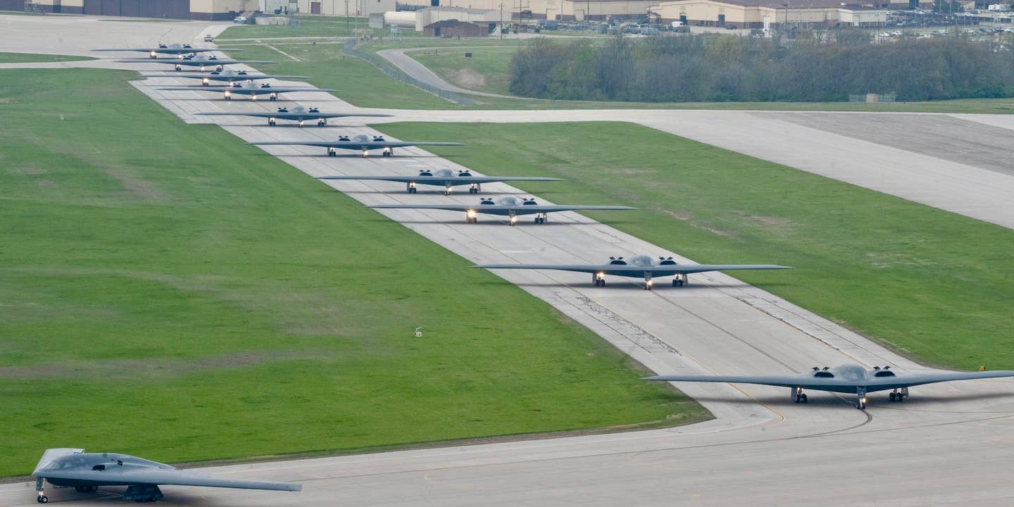 B-2 Spirit stealth bombers assigned to the 509th Bomb Wing taxi on the runway at Whiteman Air Force Base, Missouri, April 15, 2024. Team Whiteman executed a mass fly-off of 12 B-2s to cap off the annual Spirit Vigilance exercise. Routine training ensures that Airmen are always ready to execute global strike operations… anytime, anywhere. (U.S. Air Force photo by Airman 1st Class Hailey Farrell)