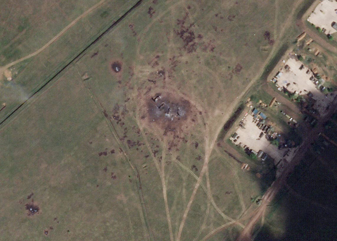 Damage around the S-400/S-300 system including wrecked components and extensive scorch marks, in a satellite image from April 19. <em>PHOTO © 2024 PLANET LABS INC. ALL RIGHTS RESERVED. REPRINTED BY PERMISSION.</em><br>