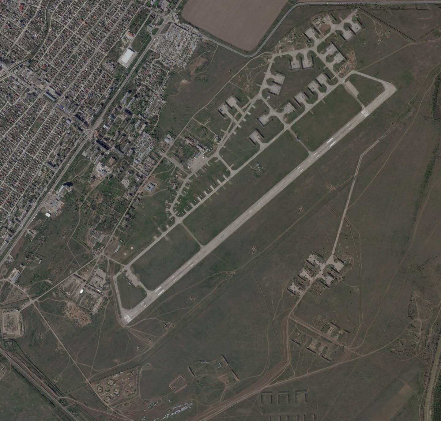 An overall view of the airbase at Dzhankoi in a satellite image from April 9. <em>PHOTO © 2024 PLANET LABS INC. ALL RIGHTS RESERVED. REPRINTED BY PERMISSION.</em><br>