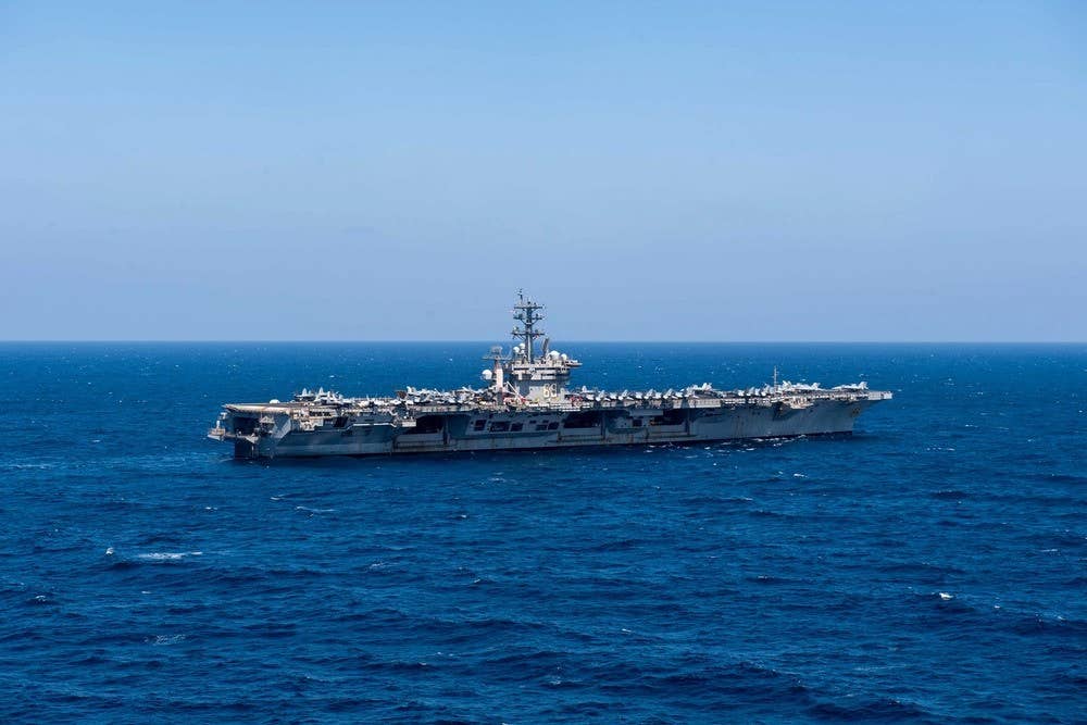 The aircraft carrier USS <em>Dwight D. Eisenhower</em> sails in the Gulf of Aden, Dec.18, 2023. (U.S. Navy photo by Mass Communication Specialist 3rd Class Nicholas Rodriguez)