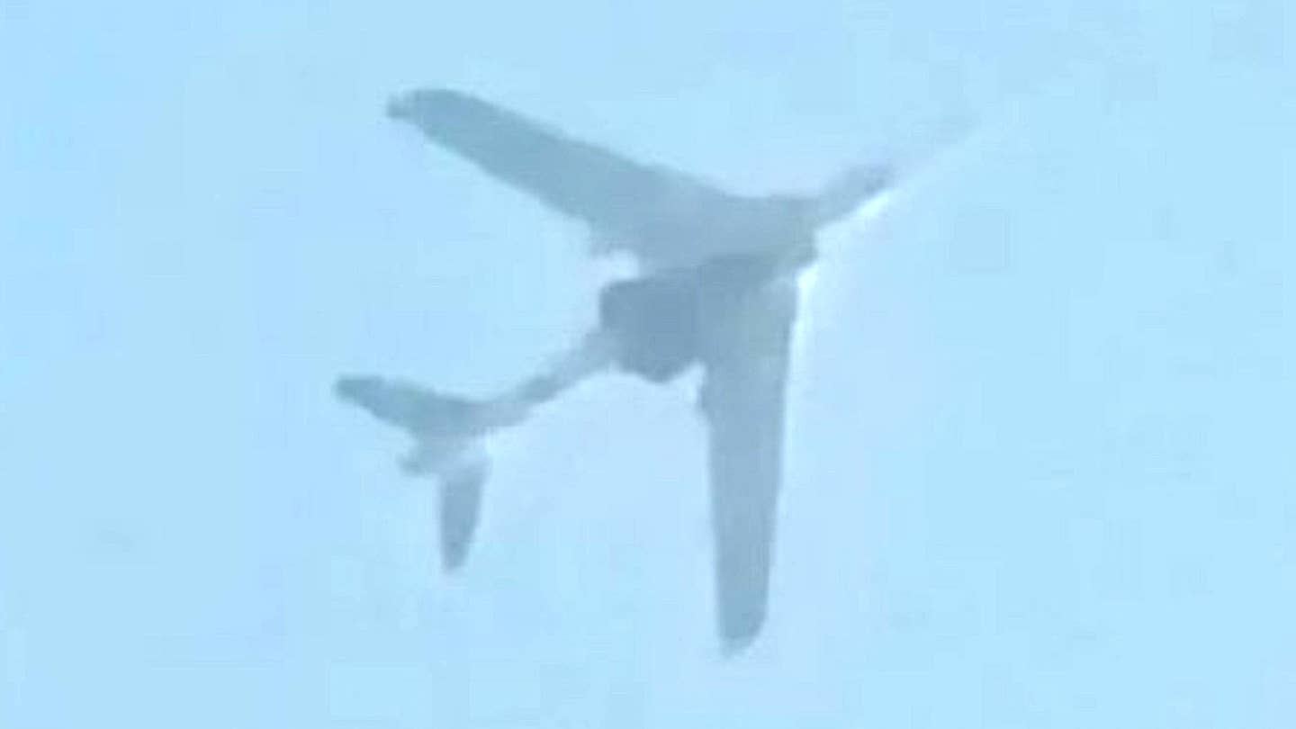 A picture has emerged purportedly showing a Chinese H-6 bomber carrying a large mystery payload underneath its fuselage.