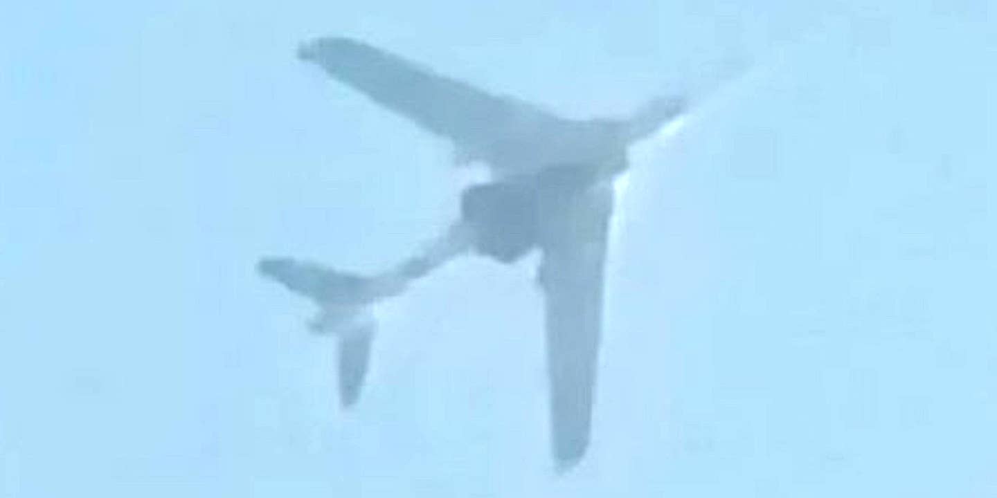 A picture has emerged purportedly showing a Chinese H-6 bomber carrying a large mystery payload underneath its fuselage.