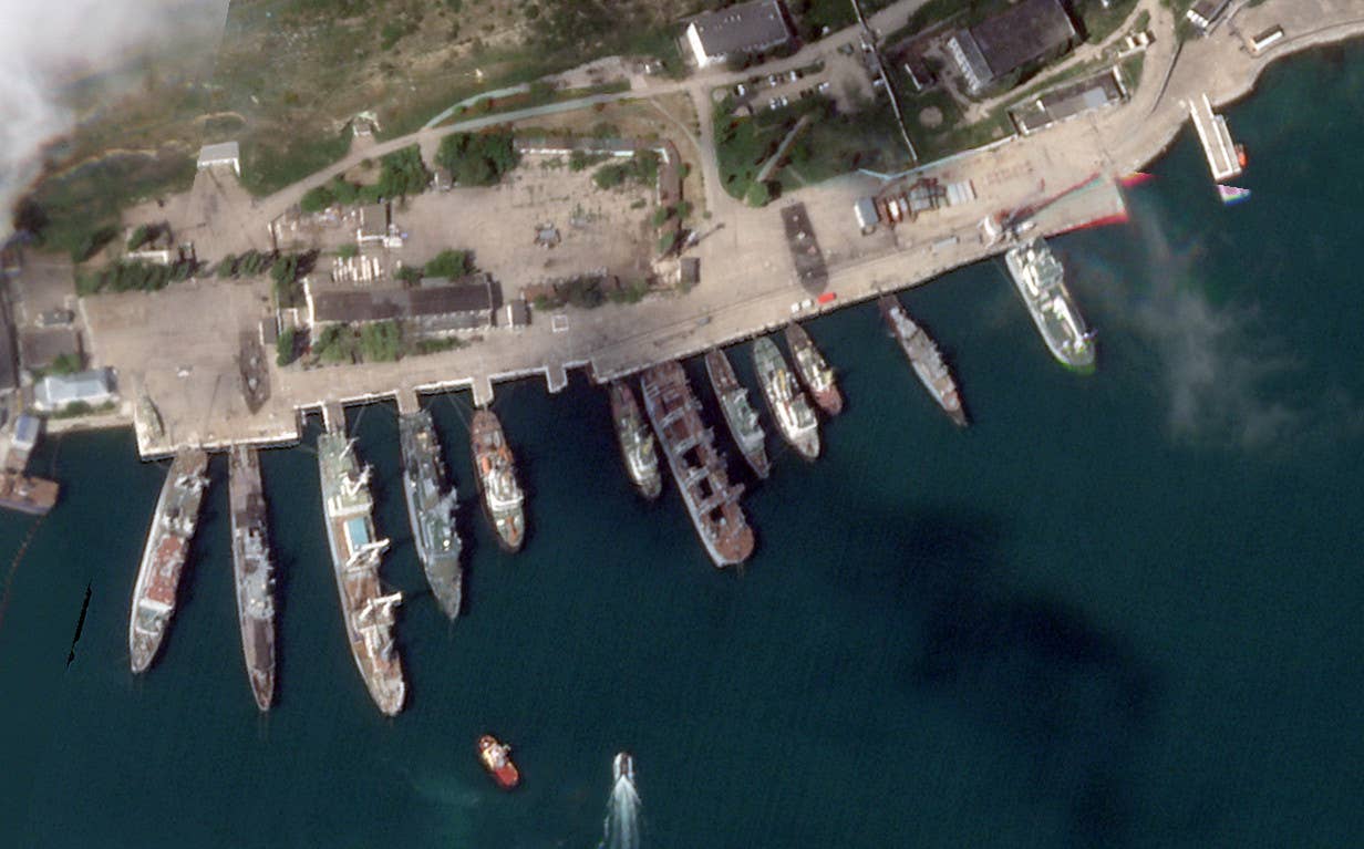 A satellite image showing the very distinctive Kommuna with its catamaran hull in port in Sevastopol on April 22 with no clearly visible indications of any damage. <em>PHOTO © 2024 PLANET LABS INC. ALL RIGHTS RESERVED. REPRINTED BY PERMISSION</em>