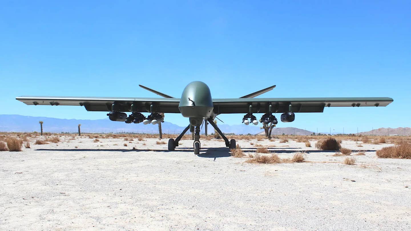 A picture GA-ASI released in 2022 showing Mojave with a pair of DAP-6 gun pods and various missiles under its wings. <em>GA-ASI</em>