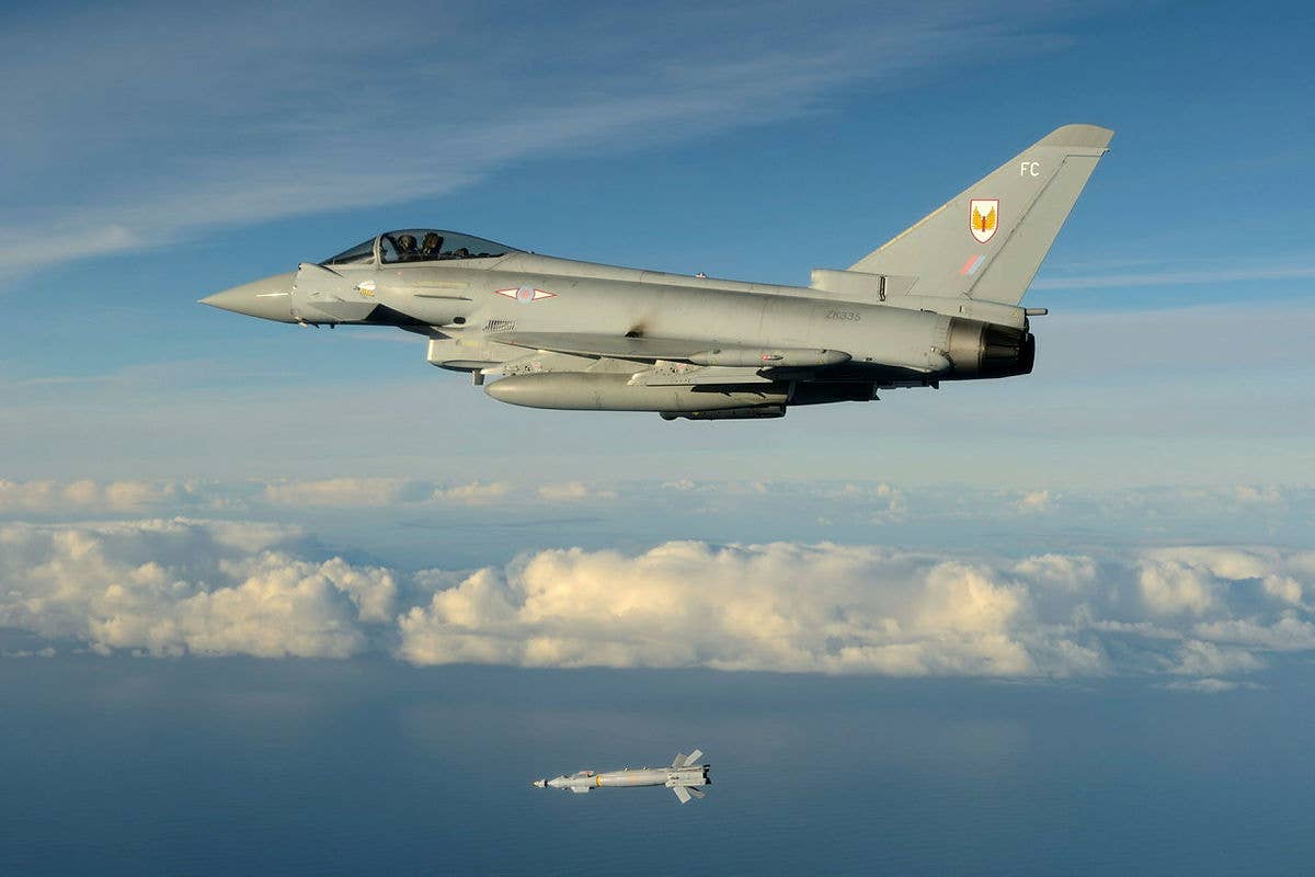 A U.K. Royal Air Force Typhoondrops a Paveway IV during a live-weapon testing sortie. The aircraft used a Litening III targeting pod to carry out the precision strike. <em>Crown Copyright</em><br>