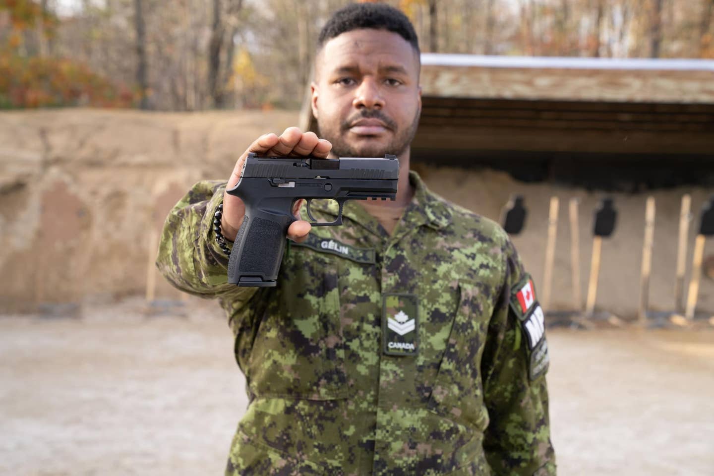 Master Corporal Gélin, MP, holding the new Sig Sauer C24, serial 001. <em>Canadian Armed Forces via Facebook</em>