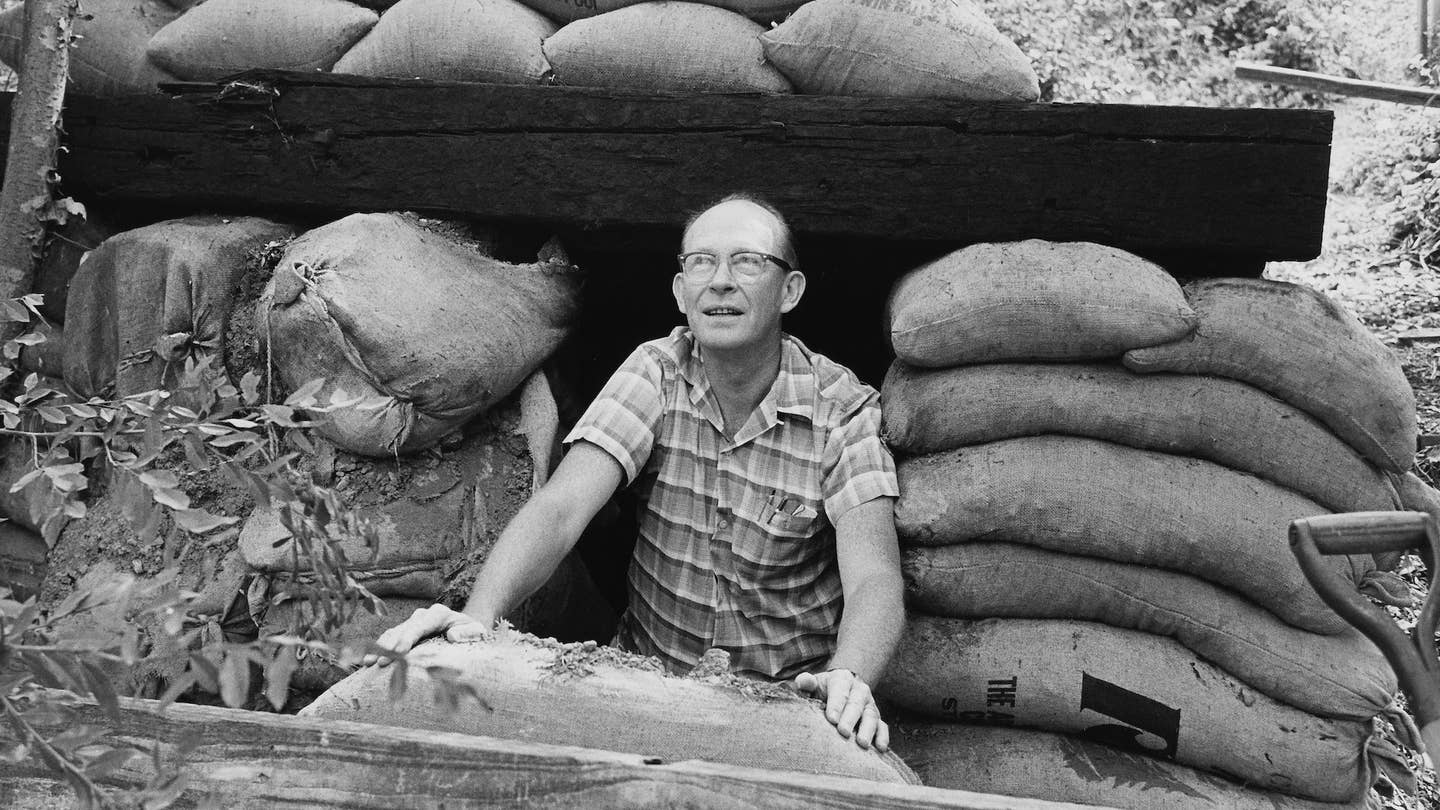 American chemist and Nobel laureate Dr Willard Libby (1908 - 1980) in the fallout shelter he built himself near his home in California, USA, circa 1960. The shelter, intended to withstand a nuclear blast, burnt down in the Bel Air Fire of November 1961. Libby was on the General Advisory Committee of the Atomic Energy Commission. (Photo by/Pix/Michael Ochs Archives/Getty Images)
