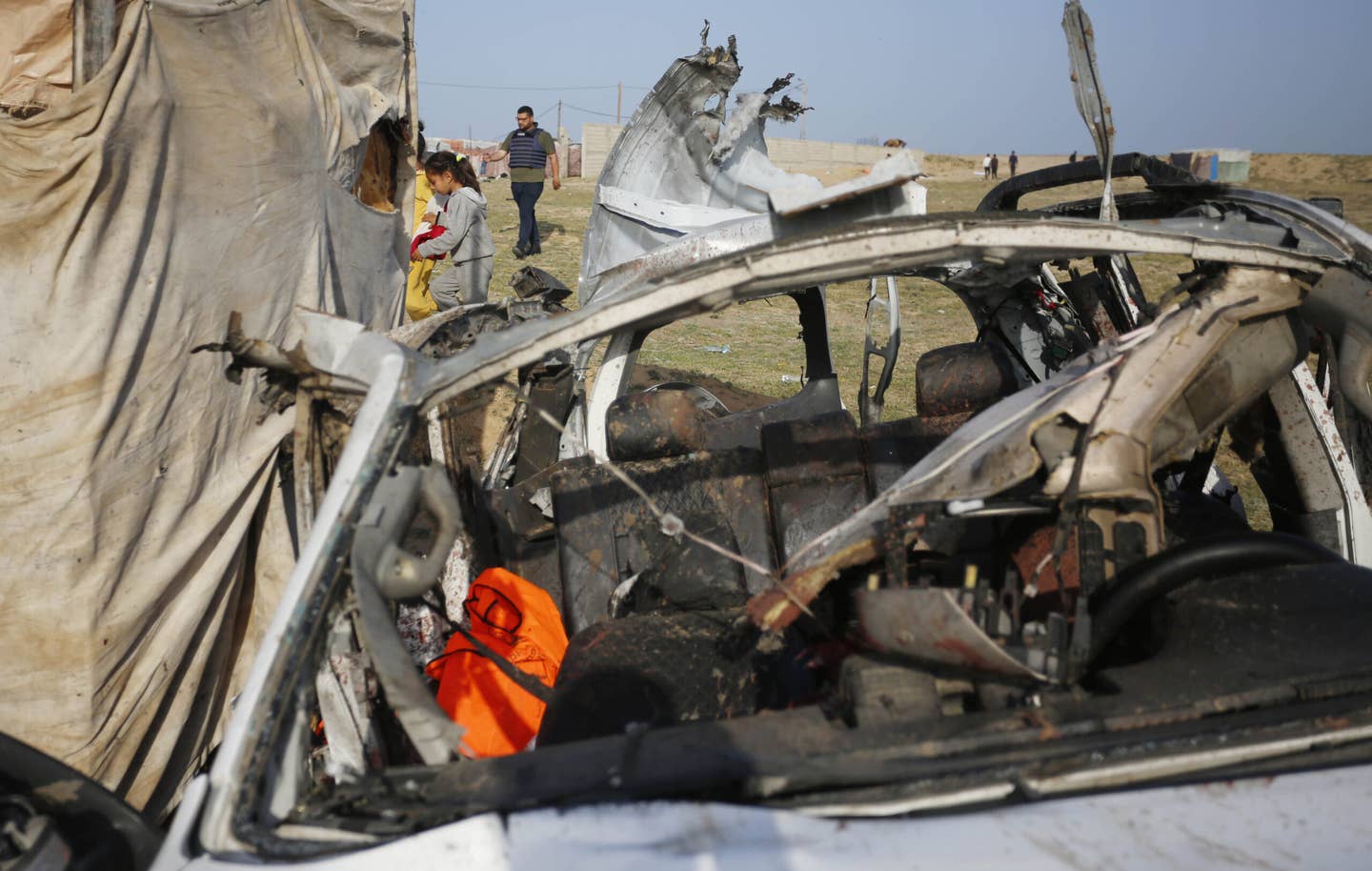 Heavily damaged vehicle belonging to the US-based international volunteer aid organization World Central Kitchen is seen after an Israeli attack that killed seven of the group's aid workers. (Photo by Ashraf Amra/Anadolu via Getty Images)