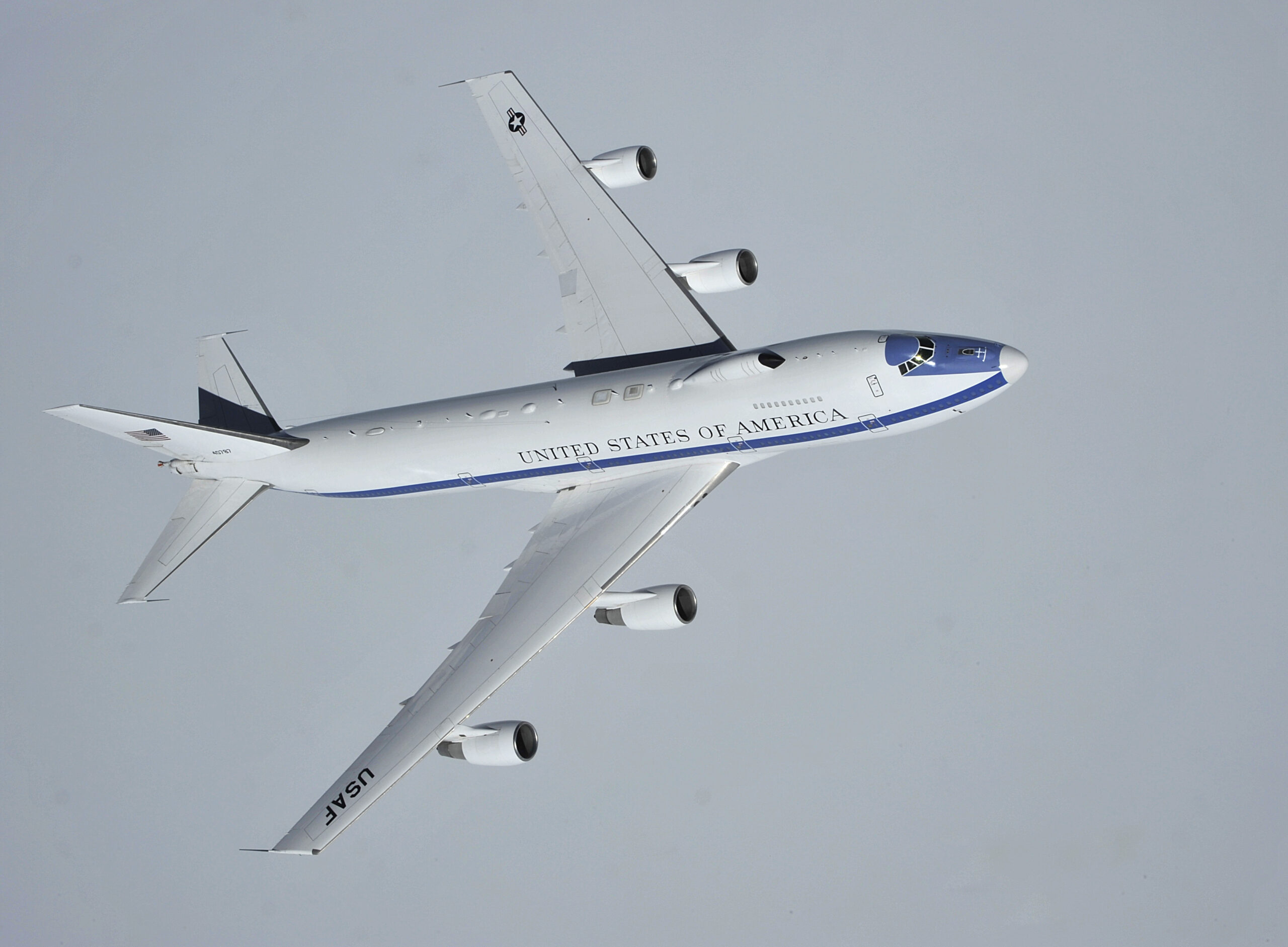 An Air Force E-4B flies over the Canadian Pacific Coast on April 10, 2014. This shot gives us a good look at the E-4's spine, which is festooned with antennas. (U.S. Air Force photo by Senior Airman Mary O'Dell)