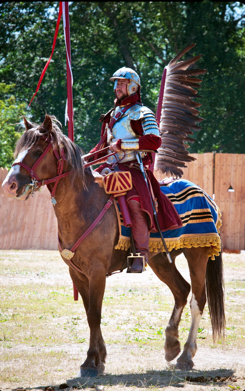 Historical re-enactor in Winged Hussars armor, 2013.<em> kdkirina5@mail.ru via Wikimedia Commons</em>