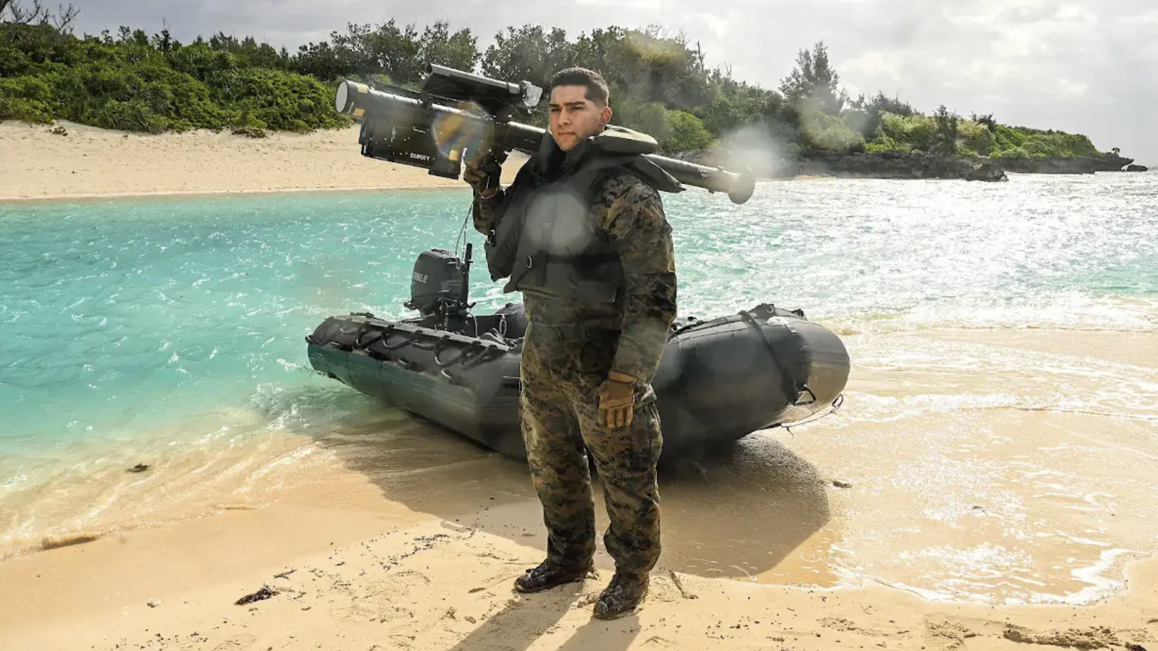A Marine holding a Stinger missile launcher and standing in front of a Combat Rubber Raiding Craft on Ukibaru Island off the coast of Okinawa during Exercise Hagatna Fury 21. Marine doctrine focuses increasingly on relatively small groups of Marines that can quickly establish forward operating bases, especially on small islands.&nbsp;<em>U.S. Marine Corps</em>