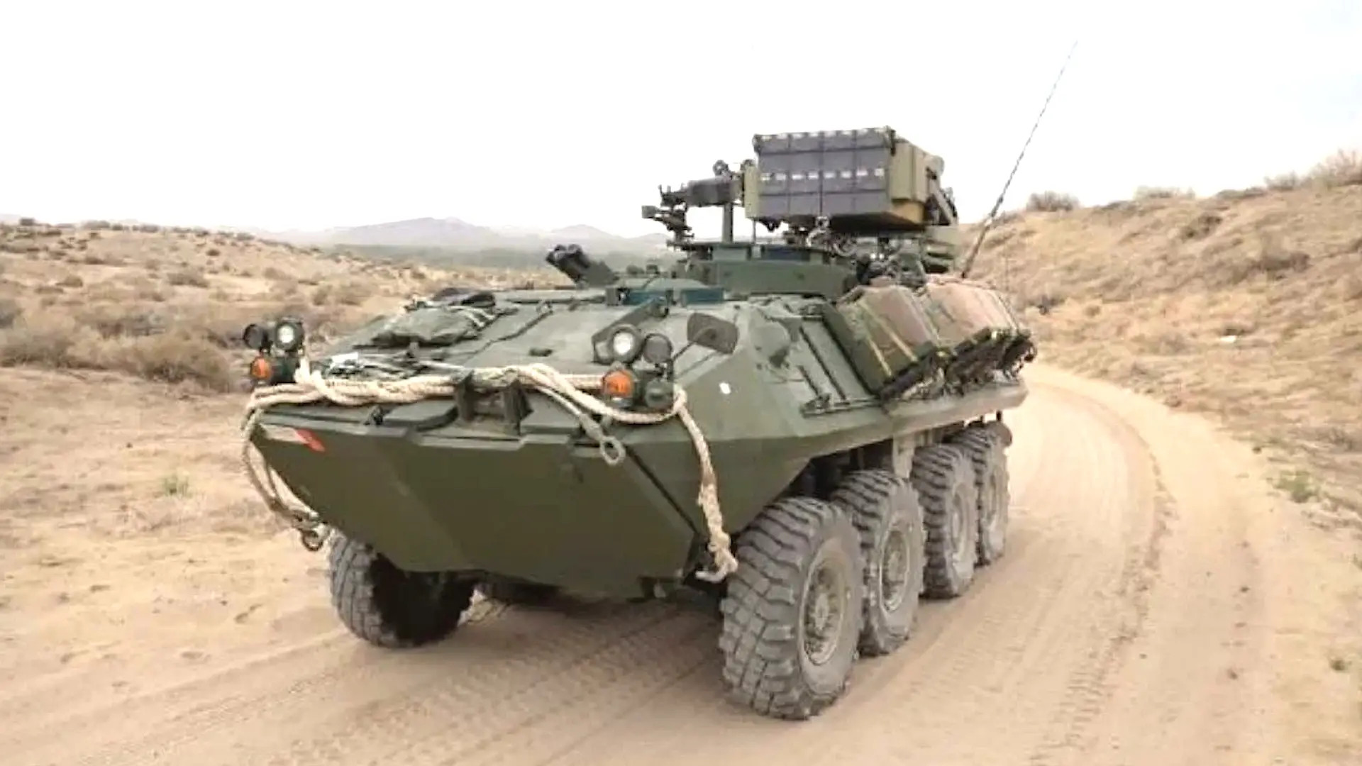 A US Marine Corps 8x8 LAV-M mortar carrier vehicle fitted with a launcher for UVision Hero-120 loitering munitions. <em>UVision</em>