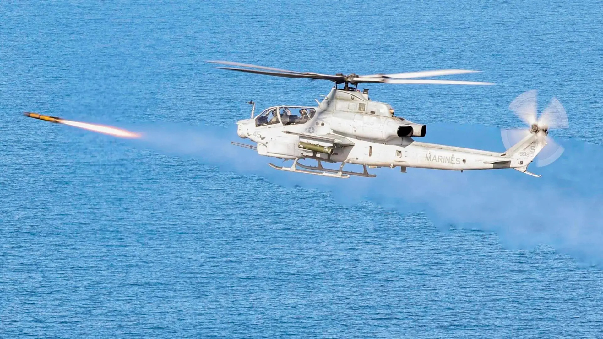 A Marine AH-1Z attack helicopter fires an AGM-179 Joint Air-to-Ground Missile (JAGM). <em>USMC</em>