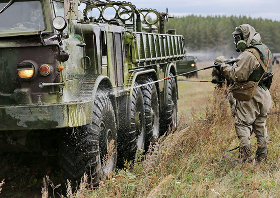 Troops from a nuclear, biological, and chemical protection unit of the Southern Military District conduct exercises at the Lebyazhye training range, in the Volgograd region, in September 2015. <em>Ministry of Defense of the Russian Federation </em>