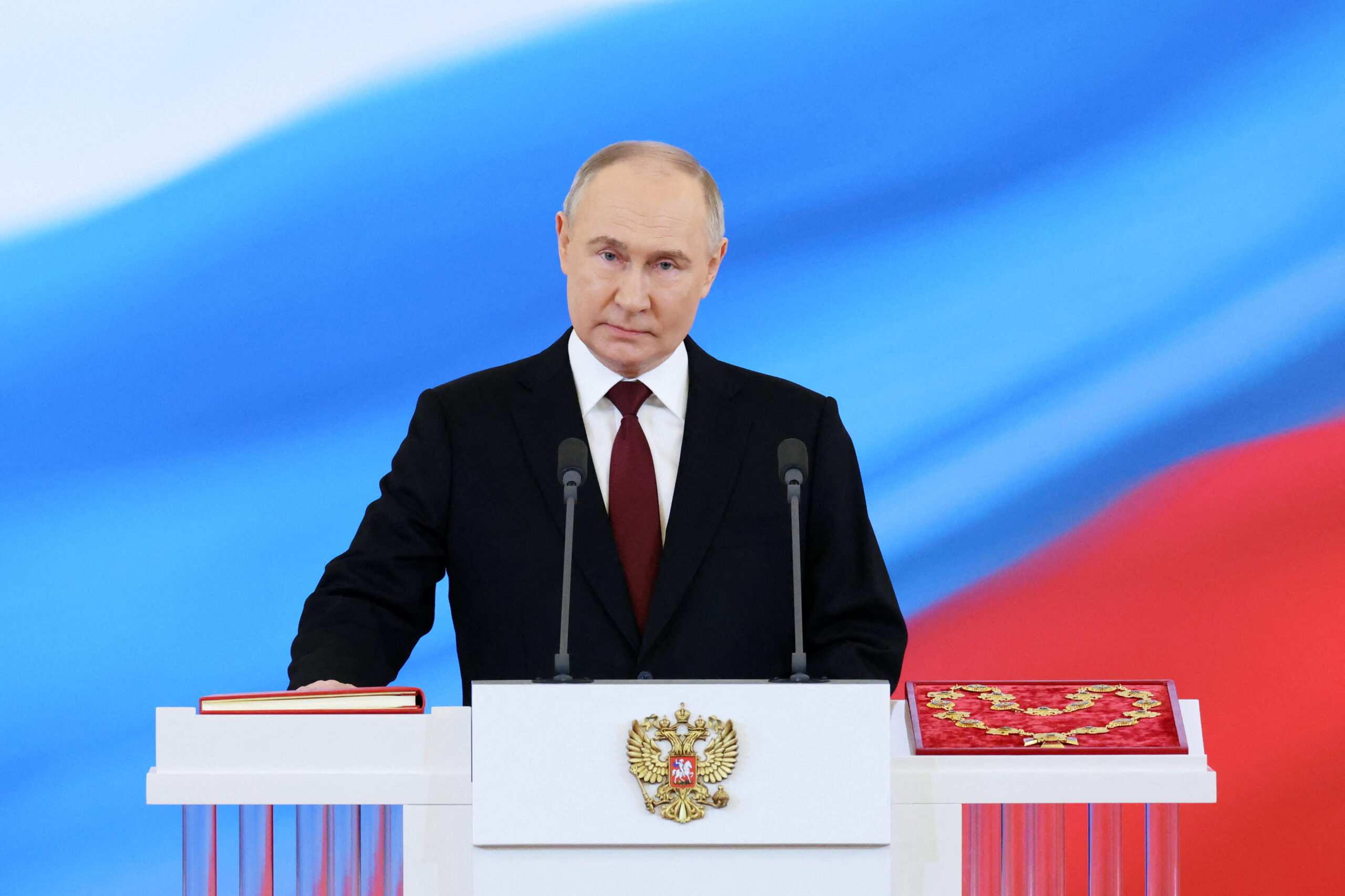 Russian president-elect Vladimir Putin takes the oath of office during a ceremony at the Kremlin in Moscow on May 7, 2024. <em>Photo by ALEXANDER KAZAKOV/POOL/AFP via Getty Images</em>
