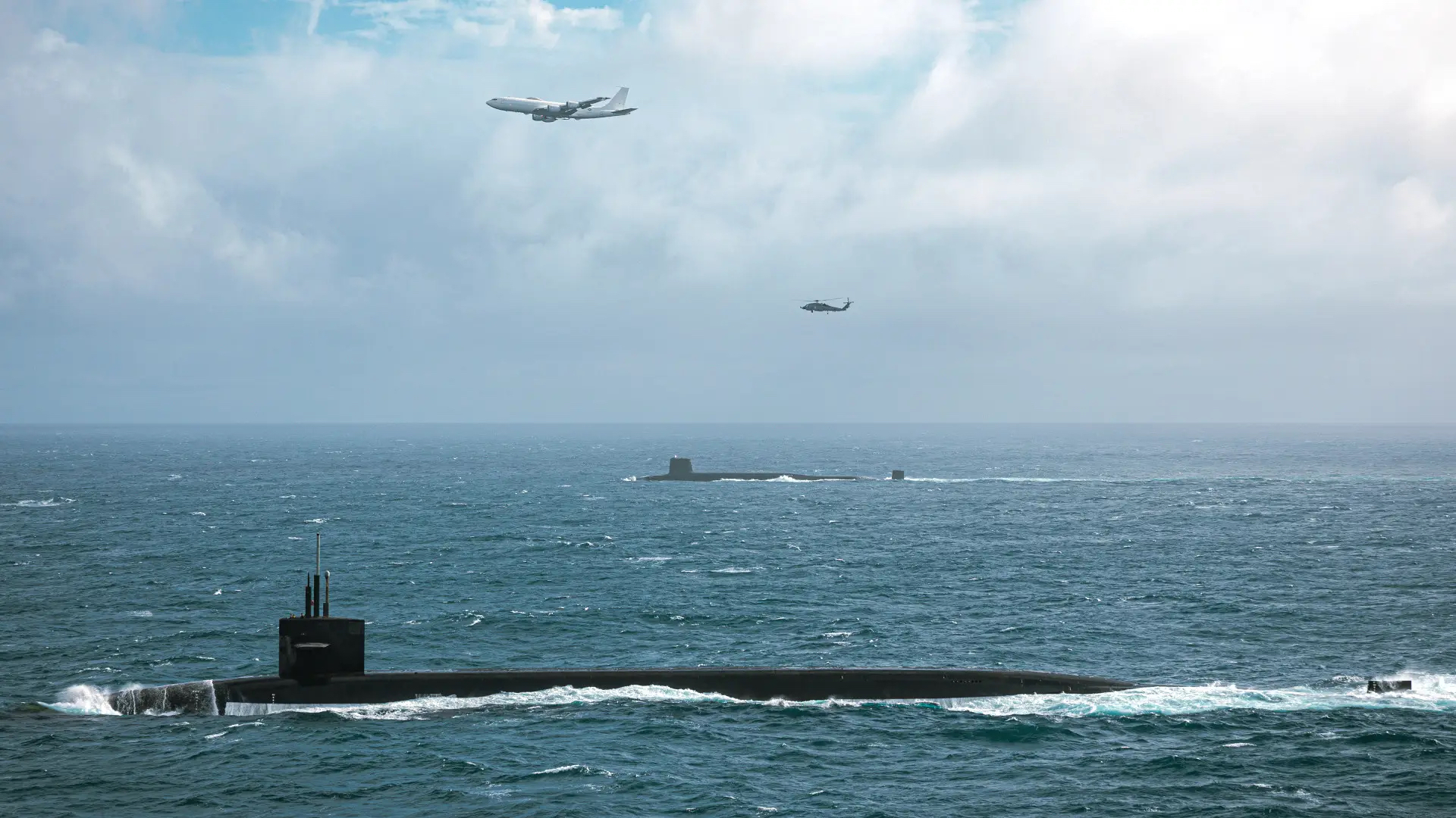 British <em>Vanguard</em> class and U.S. <em>Ohio</em> class submarines pictured in the Atlantic Ocean, late-2022. <em>U.S. Navy</em>