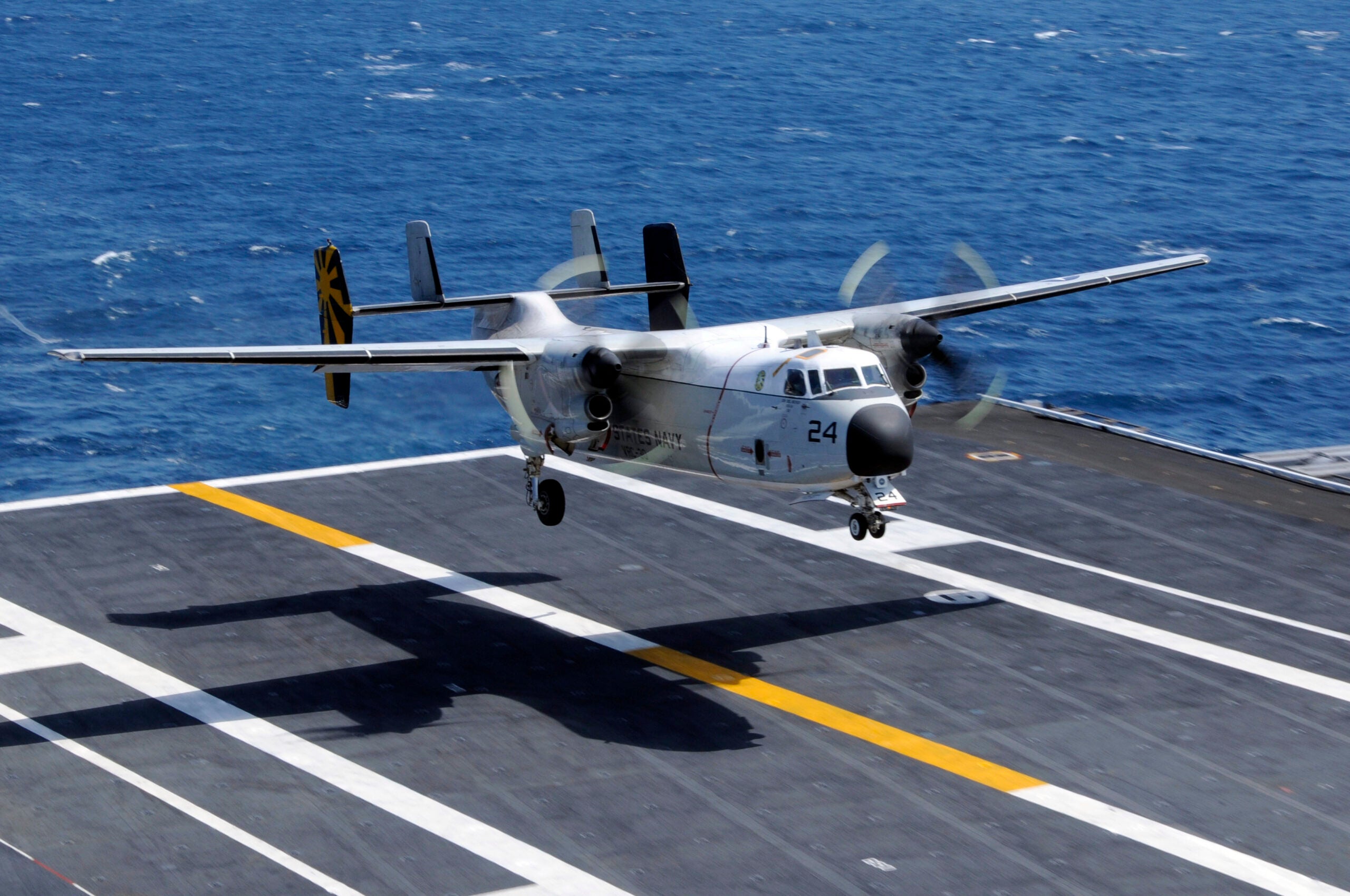 PACIFIC OCEAN (July 12, 2020) A C-2A Greyhound assigned to the Providers of Fleet Logistics Support Squadron 30 lands aboard the aircraft carrier USS Nimitz. (U.S. Navy photo by Mass Communication Specialist 3rd Class Peter Merrill)