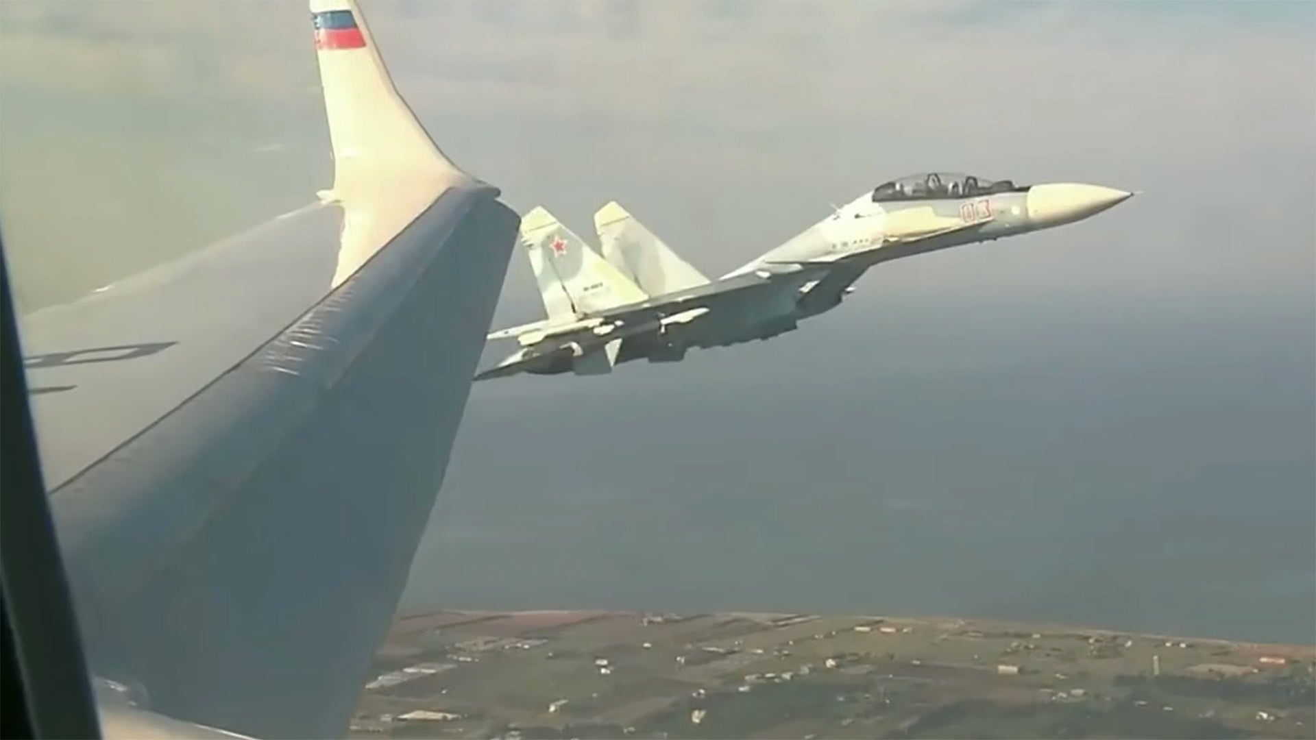 Su-30s Acted As Infrared “Heat Traps” For Putin’s Arrival In Syria Aboard A Tu-214PU