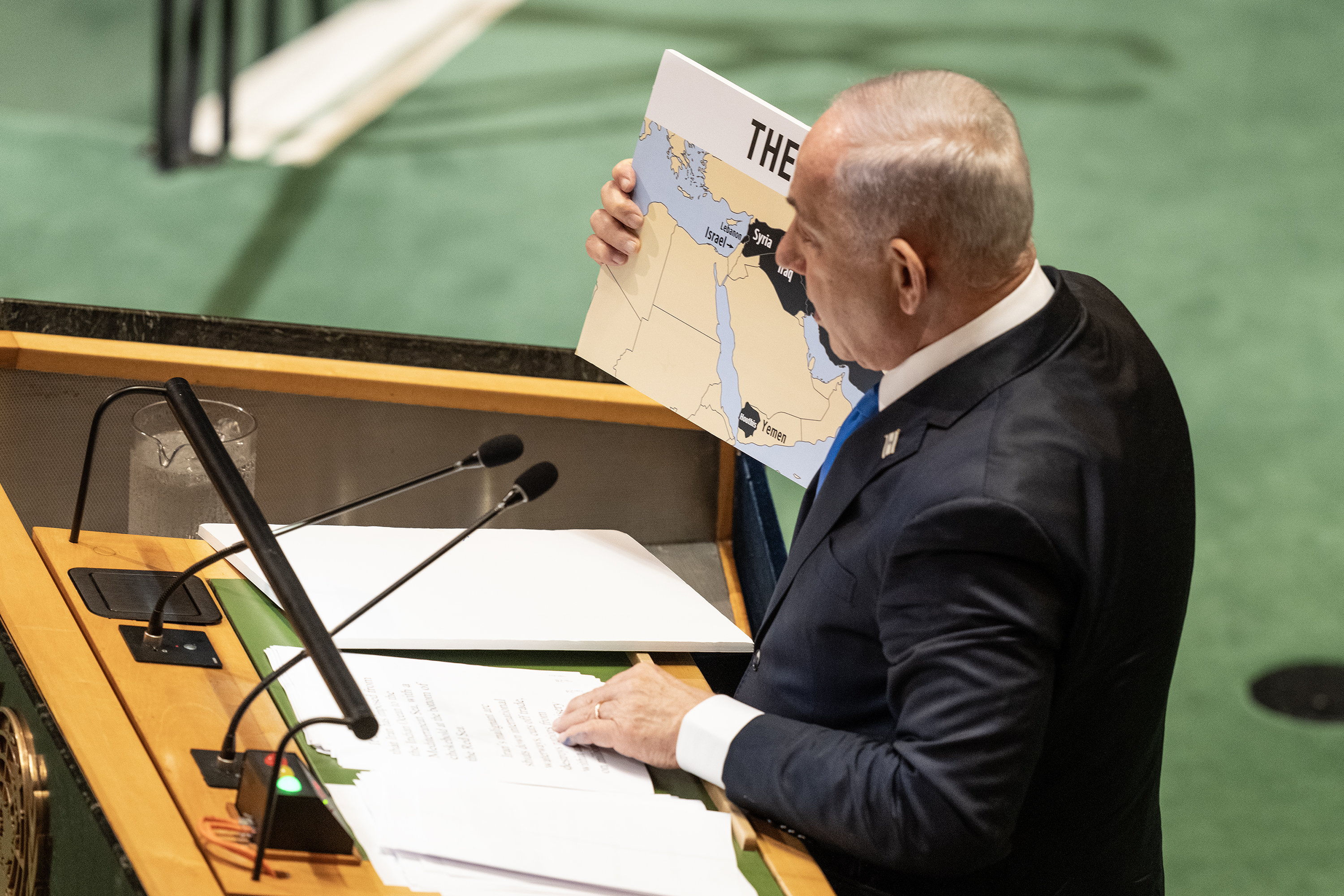 NEW YORK, UNITED STATES - 2024/09/27: Prime Minister of Israel Benjamin Netanyahu addresses the 79th session of General Assembly while holding a map of Middle East with countries hosting terrorist groups supported by Iran showing in black at UN Headquarters. (Photo by Lev Radin/Pacific Press/LightRocket via Getty Images)