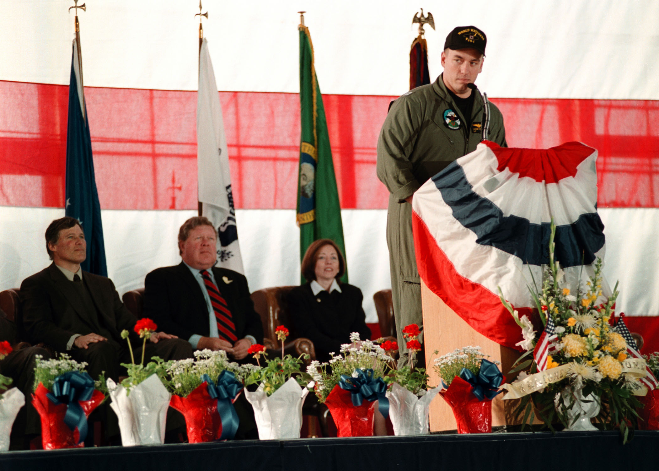 010414-N-6939M-005 Aboard Naval Air Station, Whidbey Island, Wash. (Apr. 14, 2001) -- Lt. Shane Osborn from Norfolk, Neb., addresses a large crowd of well wishers following his return to the United States. Lt Osborn and his crew aboard a U.S. Navy EP-3 aircraft were detained by Chinese authorities following a mid-air collision with a Chinese fighter aircraft off the coast of Hunan Island, Peoples Republic of China. U.S. Navy photo by Photographer's Mate 2nd Class Christopher Mobley. (RELEASED)