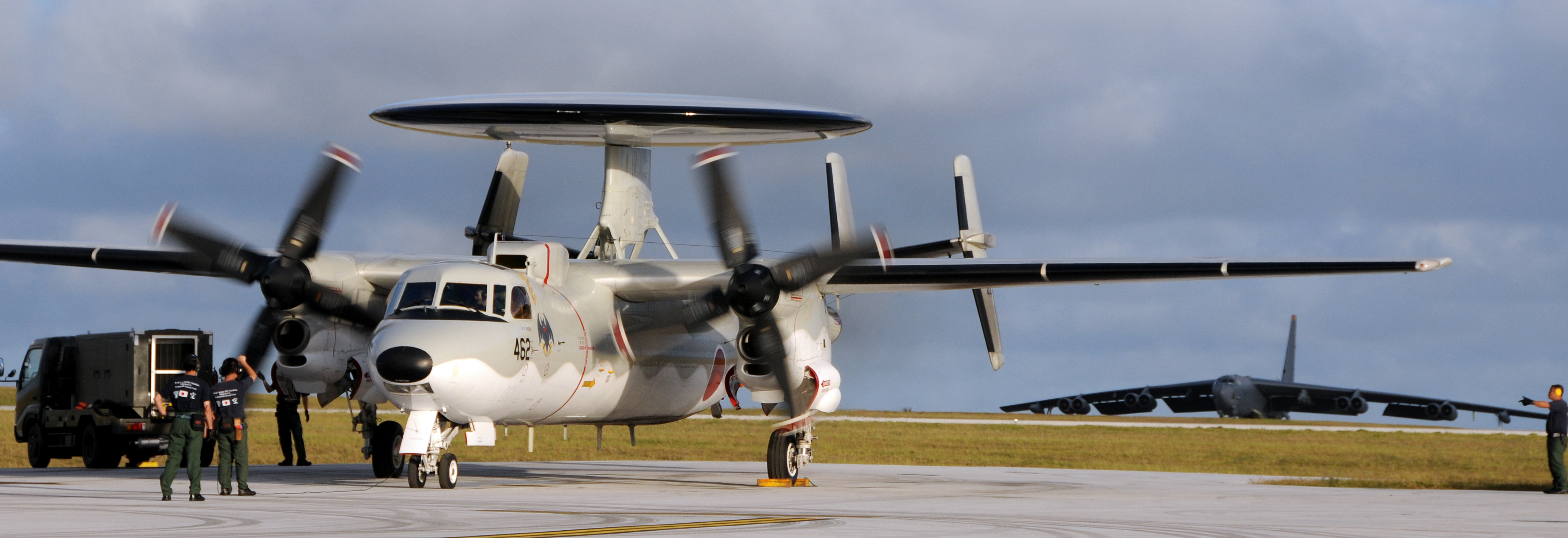 ANDERSEN AIR FORCE BASE, Guam - Japan Air Self Defense Force E-2C Hawkeye joins a United States B-52 bomber for the two week Cope North exercise here Feb. 4. Cope North is two-week annual Bilateral exercise between U.S. forces and the Japan Air Self Defense Force that began Feb. 2, and is designed to strengthen military relationships between the two countries as well as enhance U.S. and Japanese air operations in defense of Japan. (U.S. Air Force photo by Airman 1st Class Courtney Witt)