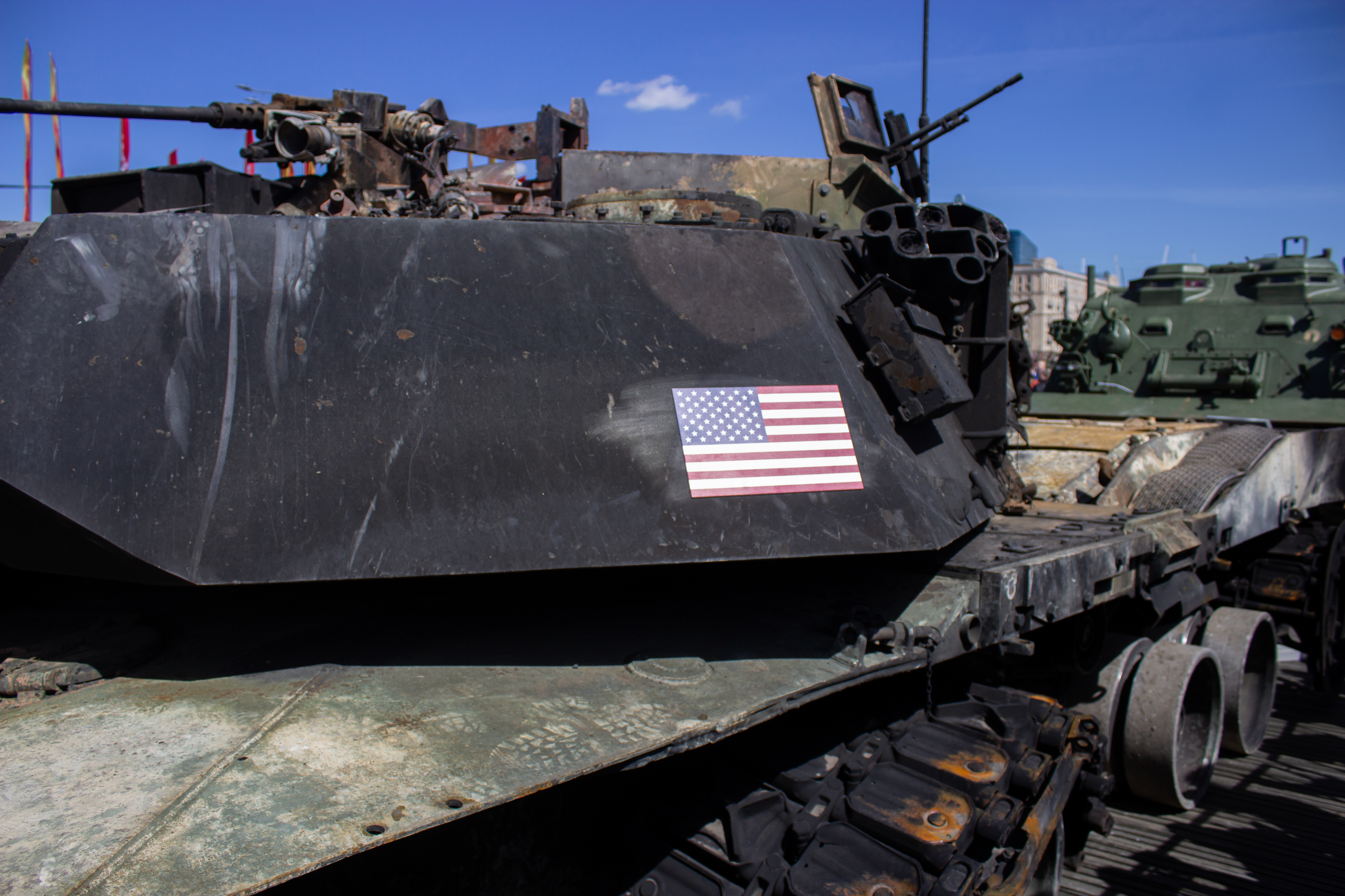 MOSCOW, RUSSIA - 2024/05/01: A destroyed US-made M1A1 Abrams tank is seen at a newly opened exhibition of trophy military equipment in Moscow. The posters read "Victory." An exhibition of trophy military equipment captured by Russian servicemen during the Russian-Ukraine war, known as the special military operation in Russia, opened in the Victory Park in Moscow on May 1, 2024. Damaged, destroyed, and captured military equipment of NATO countries and Ukraine are exhibited to the Russian public. The Russian-Ukraine war began on February 24, 2024. Since then the NATO countries have been supplying the Ukraine army with weapons. (Photo by Vlad Karkov/SOPA Images/LightRocket via Getty Images)