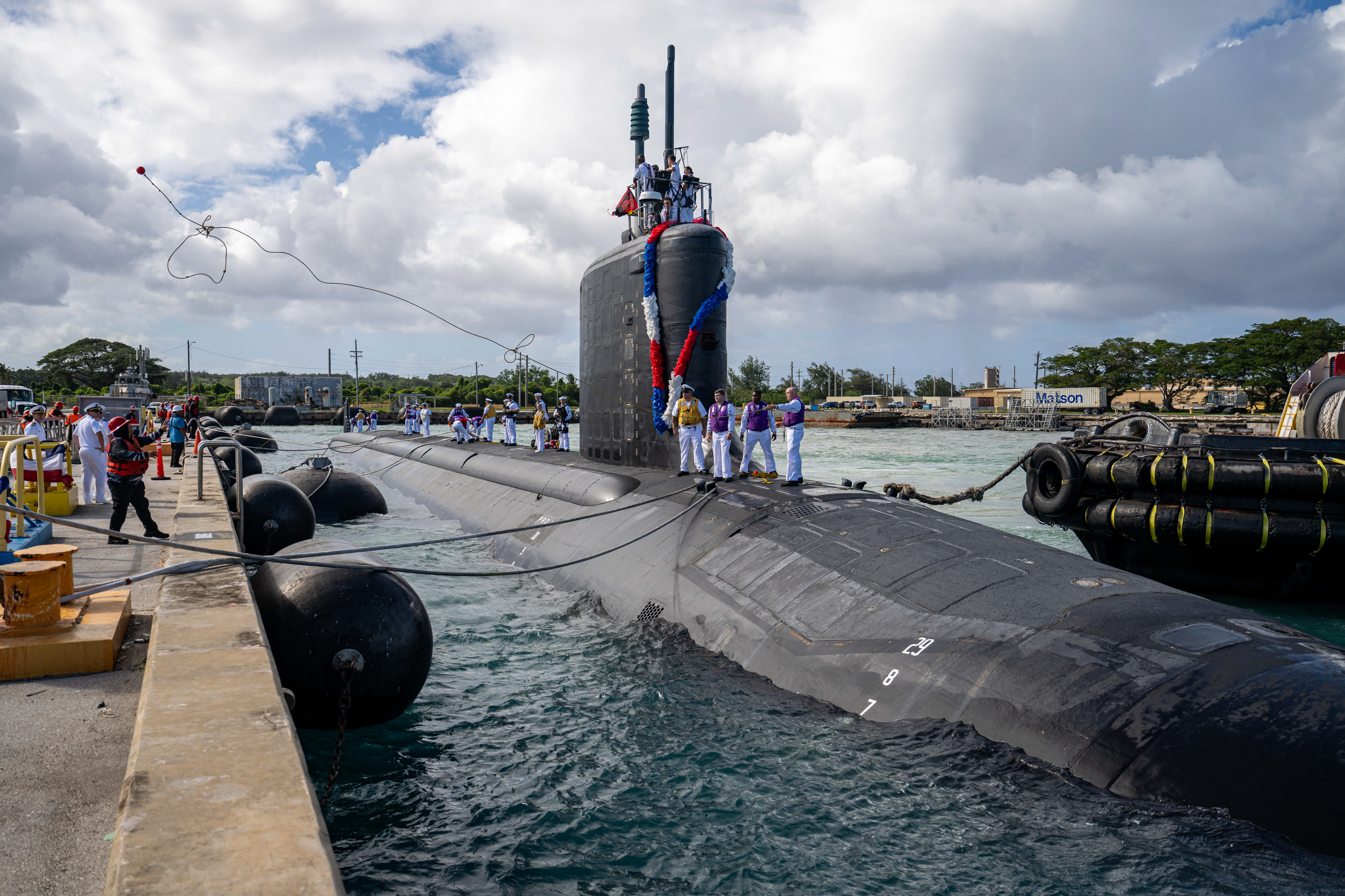 241126-N-VC599-1076 U.S. NAVAL BASE GUAM (Nov. 26, 2024) – The Virginia-class fast attack submarine USS Minnesota (SSN 783) arrives onboard U.S. Naval Base Guam, Nov 26. Minnesota, the first Virginia-class fast-attack submarine to be forward deployed to Guam, joins four Los Angeles-class fast-attack submarines forward deployed in the Pacific. Regarded as apex predators of the sea, Guam's fast-attack submarines serve at the tip of the spear, helping to reaffirm the submarine forces' forward-deployed presence in support of a free and open Indo-Pacific. (U.S. Navy photo by Mass Communication Specialist 1st Class Justin Wolpert)
