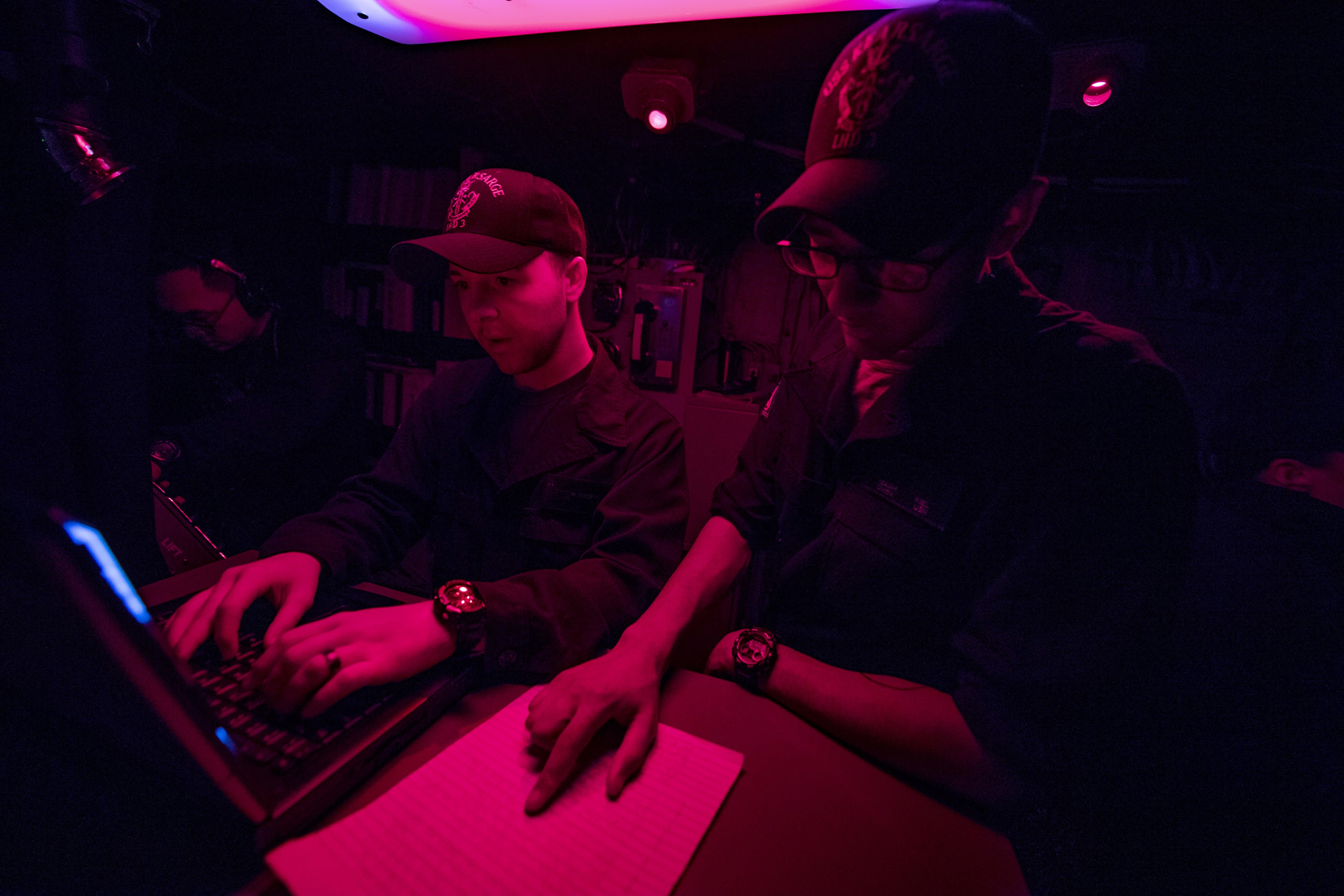 190101-N-UP035-0042 MEDITERRANEAN SEA (Jan. 01, 2019) Quartermaster Seaman Isaiah Kiel reads a New Year's poem as Quartermaster Seaman Dalton Rodgers enters it as the first official deck log entry of 2019 aboard amphibious assault ship USS Kearsarge (LHD-3). Kearsarge is on a scheduled deployment as part of the Kearsarge Amphibious Ready Group in support of maritime security operations, crisis response and theater security cooperation, while also providing a forward naval presence. (U.S. Navy photo by Mass Communication Specialist 1st Class Mike DiMestico/Released)