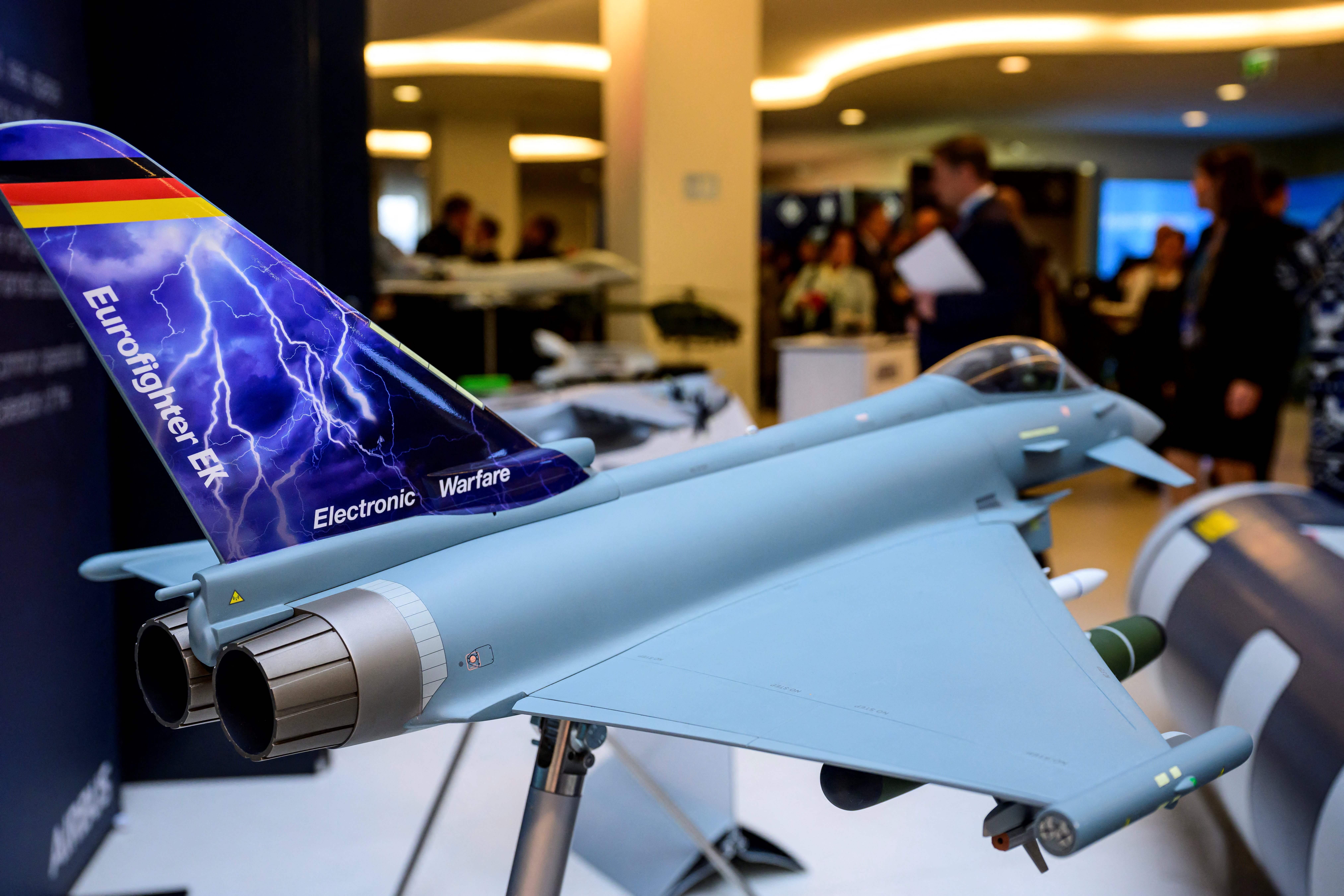 A model of the Eurofighter Typhoon EK (Eurofighter Electronic Combat) is on display at the Airbus stand at the Berlin Security Conference on European Security and Defence, on November 30, 2022 in Berlin. (Photo by John MACDOUGALL / AFP) (Photo by JOHN MACDOUGALL/AFP via Getty Images)