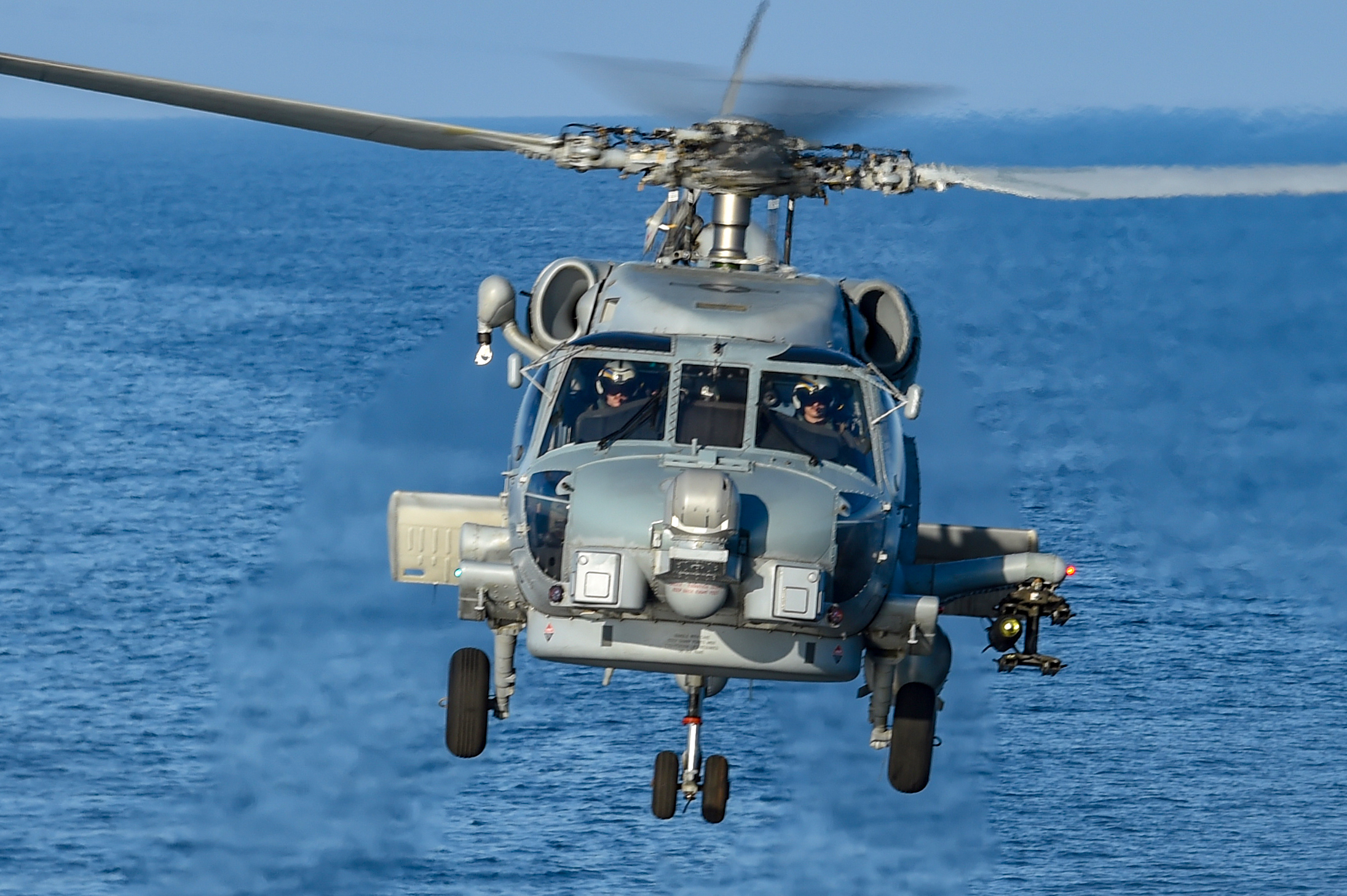 190614-N-JX484-508 BALTIC SEA (June 14, 2019) An MH-60R Seahawk helicopter from the Spartans of Helicopter Maritime Strike Squadron (HSM) 70 departs the guided-missile destroyer USS Gravely (DDG 107) for a Hellfire exercise during Baltic Operations (BALTOPS) 2019. BALTOPS is the premier annual maritime-focused exercise in the Baltic Region, marking the 47th year of one of the largest exercises in Northern Europe enhancing flexibility and interoperability among allied and partner nations. Gravely is underway on a regularly-scheduled deployment as the flagship of Standing NATO Maritime Group 1 to conduct maritime operations and provide a continuous maritime capability for NATO in the northern Atlantic. (U.S. Navy photo by Mass Communication Specialist 2nd Class Mark Andrew Hays/Released)