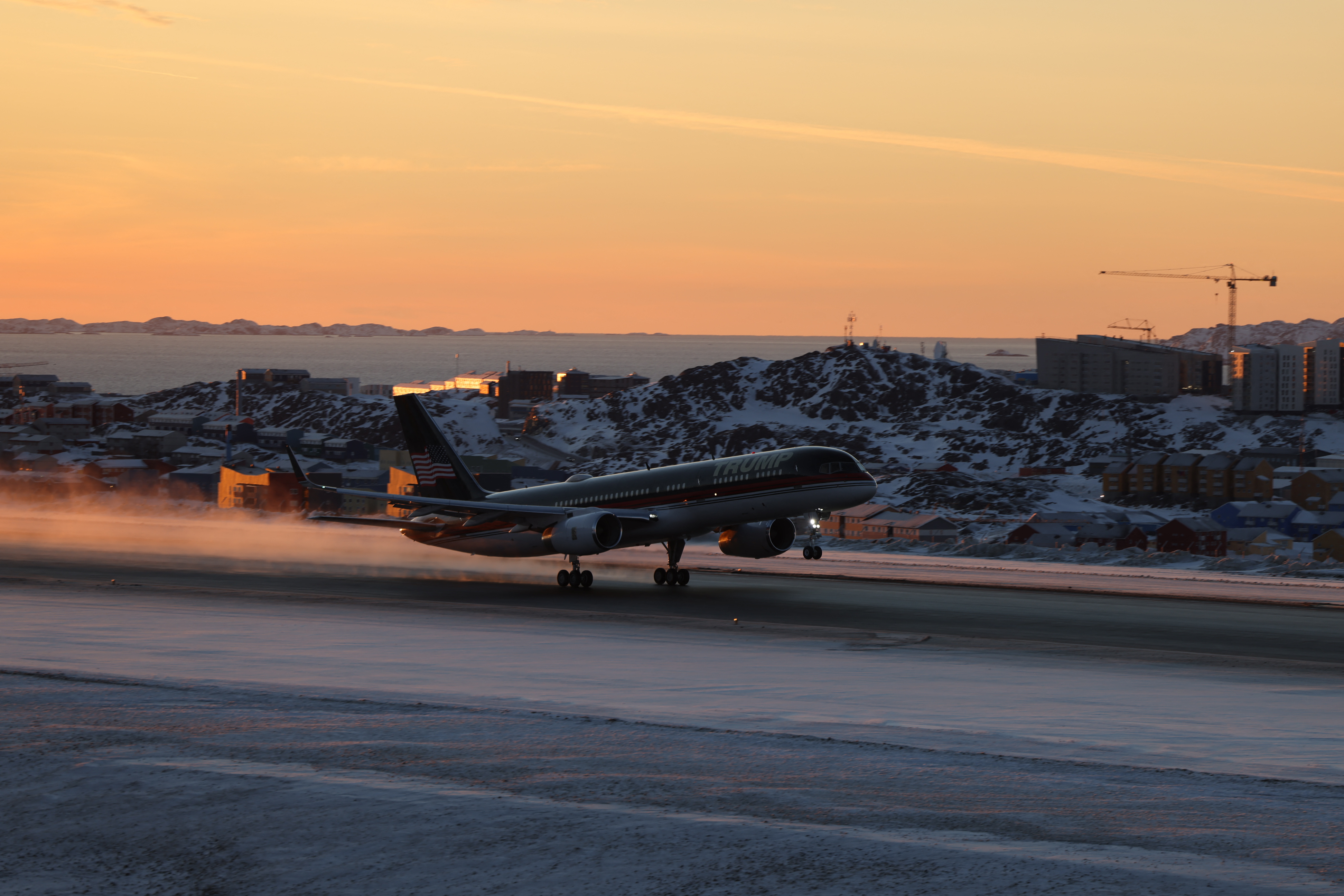 US businessman Donald Trump Jr. leaves with his plane Nuuk, Greenland on January 7, 2025. Donald Trump Jr made a private visit to Greenland, a Danish autonomous territory coveted by Trump Sr and which hopes to one day be independent but remains dependent on Copenhagen for now. (Photo by Emil Stach / Ritzau Scanpix / AFP) / Denmark OUT (Photo by EMIL STACH/Ritzau Scanpix/AFP via Getty Images)