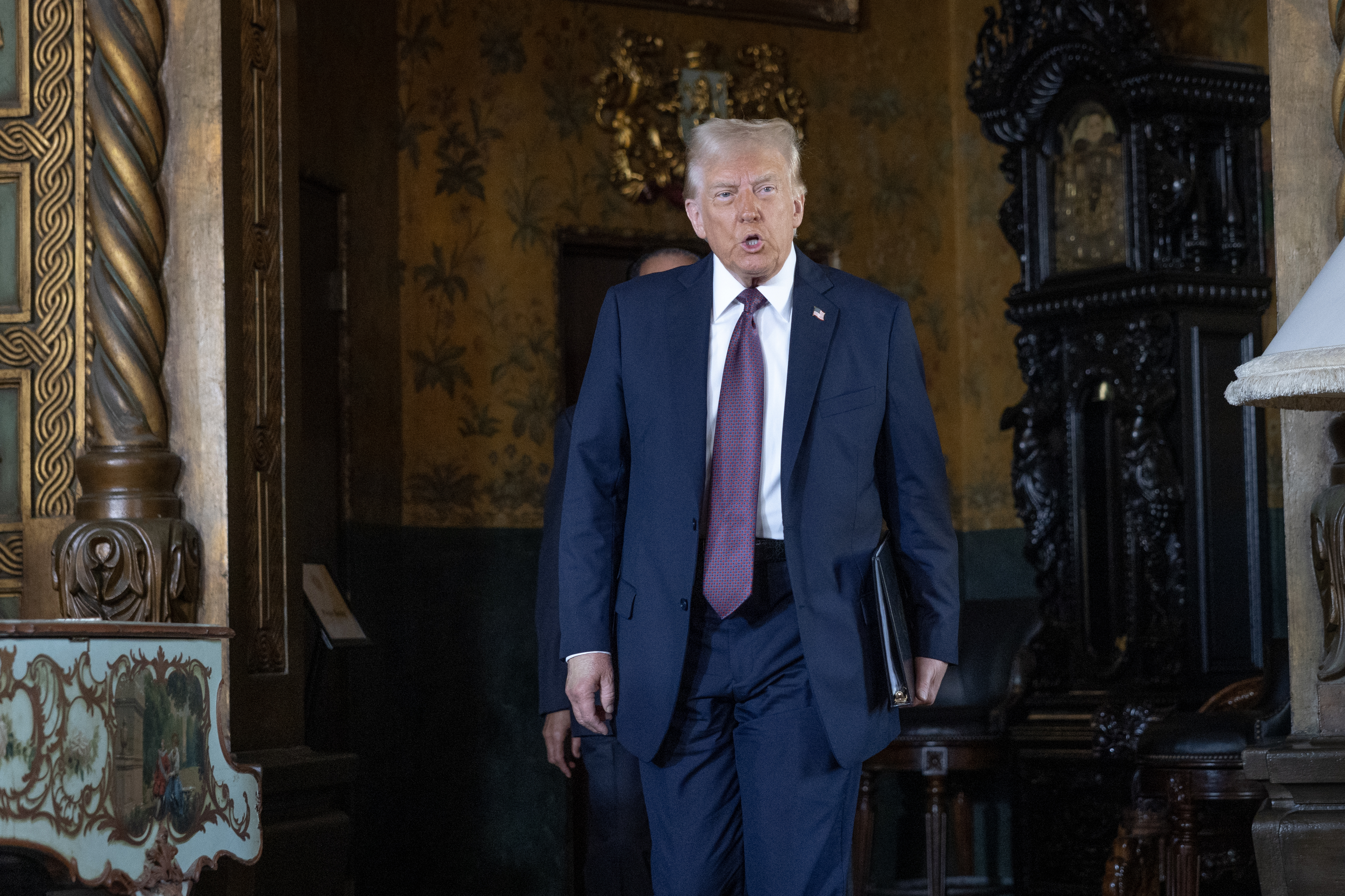 PALM BEACH, FLORIDA - JANUARY 07: U.S. President-elect Donald Trump arrives to speak to members of the media during a press conference at the Mar-a-Lago Club on January 07, 2025 in Palm Beach, Florida. Trump will be sworn in as the 47th president of the United States on January 20, making him the only president other than Grover Cleveland to serve two non-consecutive terms in the office. (Photo by Scott Olson/Getty Images)