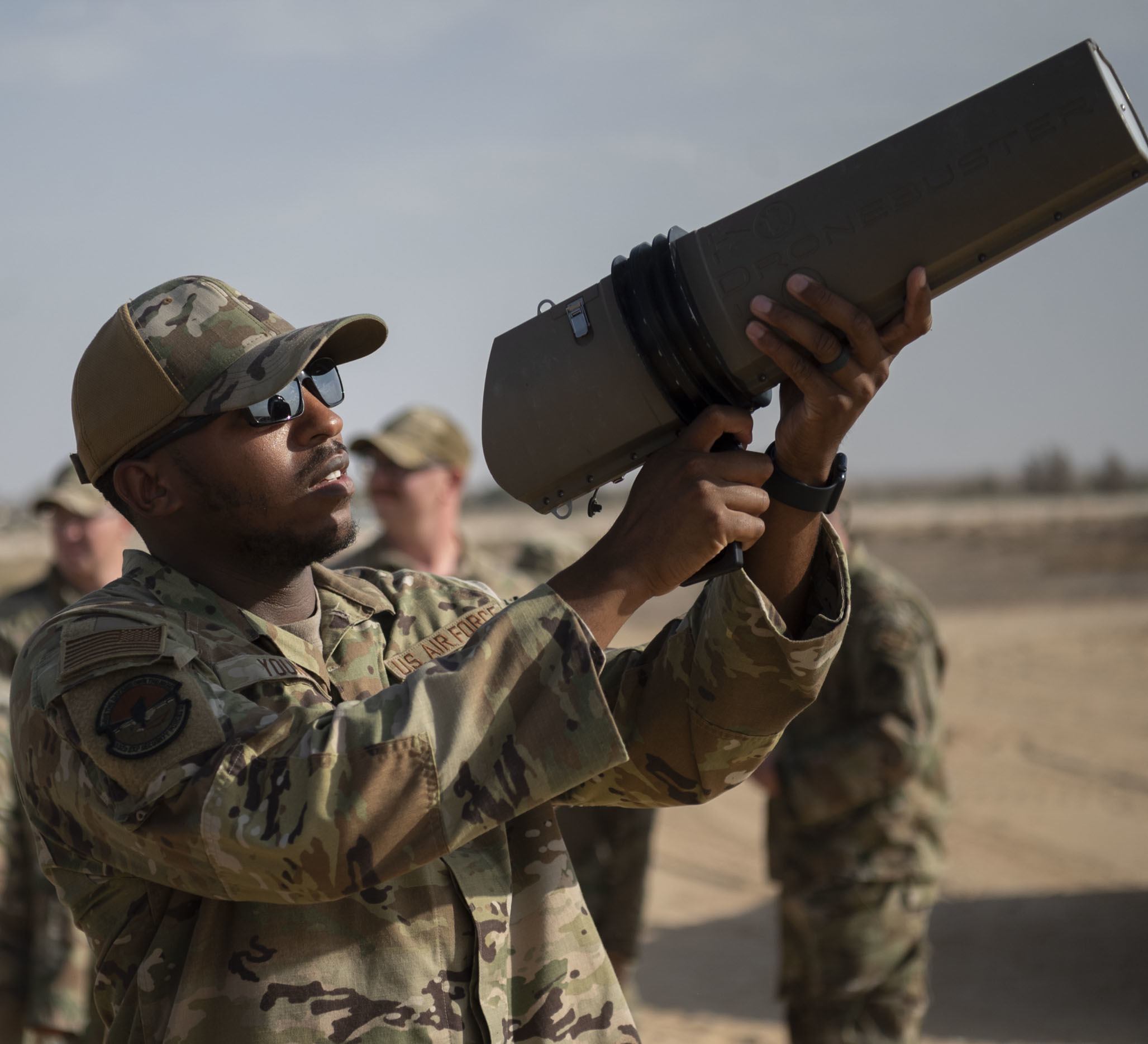 332d Expeditionary Security Forces Squadron train on counter drone tactics against small Unmanned Aerial Systems (sUAS) at an undisclosed location in Southwest Asia, September 6, 2022. ESFS Airmen train on how to spot suspicious aircraft and to use the Dronebuster to block radio signals, to potentially ground these aircraft. (U.S. Air Force photo by Tech. Sgt. Jeffery Foster)