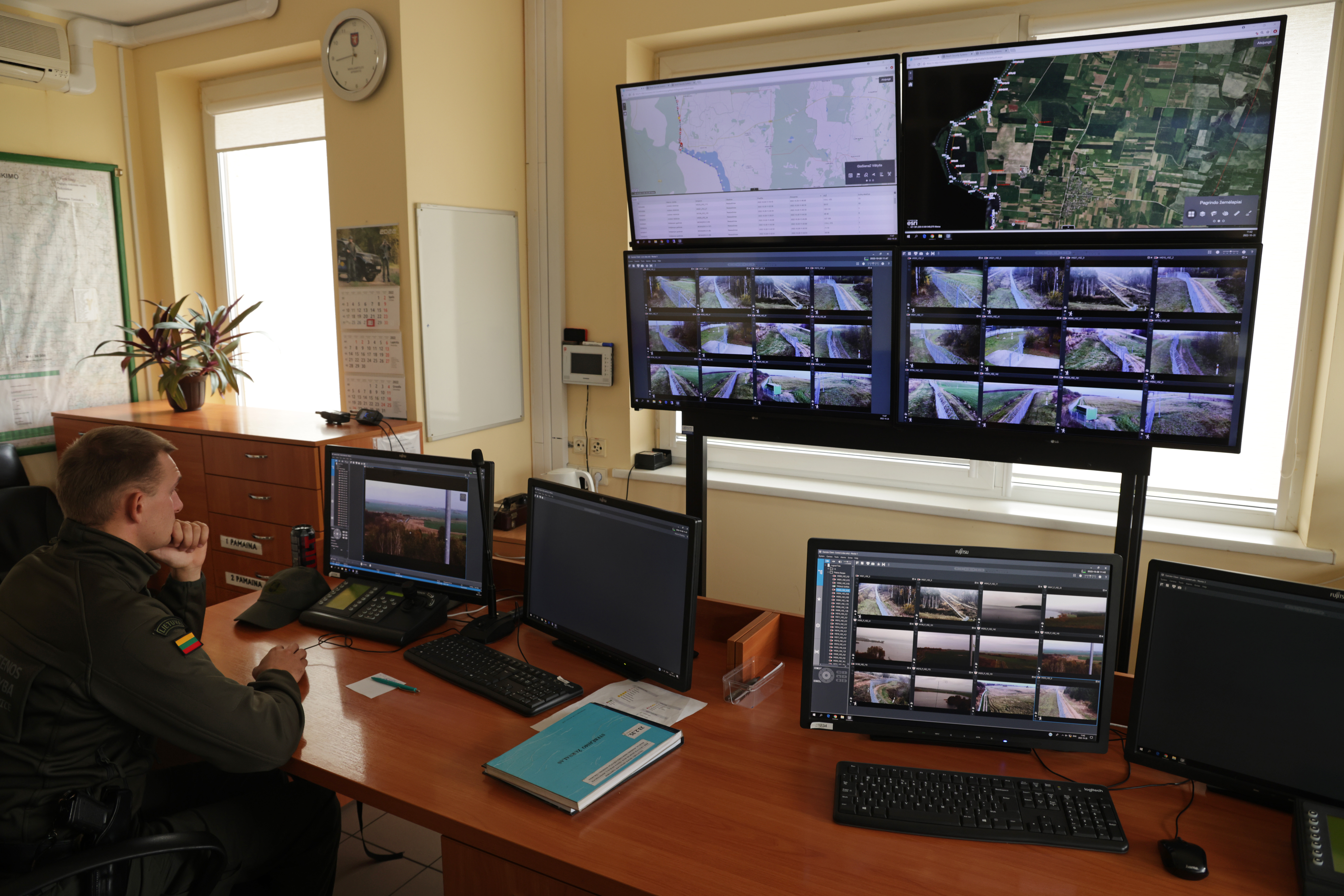 VISTYTIS, LITHUANIA - OCTOBER 28: A Lithuanian border guard monitors the video feed from cameras along the border to the Russian semi-exclave of Kaliningrad on October 28, 2022 in Vistytis, Lithuania. Vistytis lies in the strategically vital Suwalki Gap, an approximately 70km long stretch of land along the Lithuanian and Polish border between Kaliningrad and Russia-loyal Belarus. Should a military conflict ever break out, Russian control of the Suwalki Gap would cut the three Baltic states of Lithuania, Latvia and Estonia off from the rest of the European Union. (Photo by Sean Gallup/Getty Images)