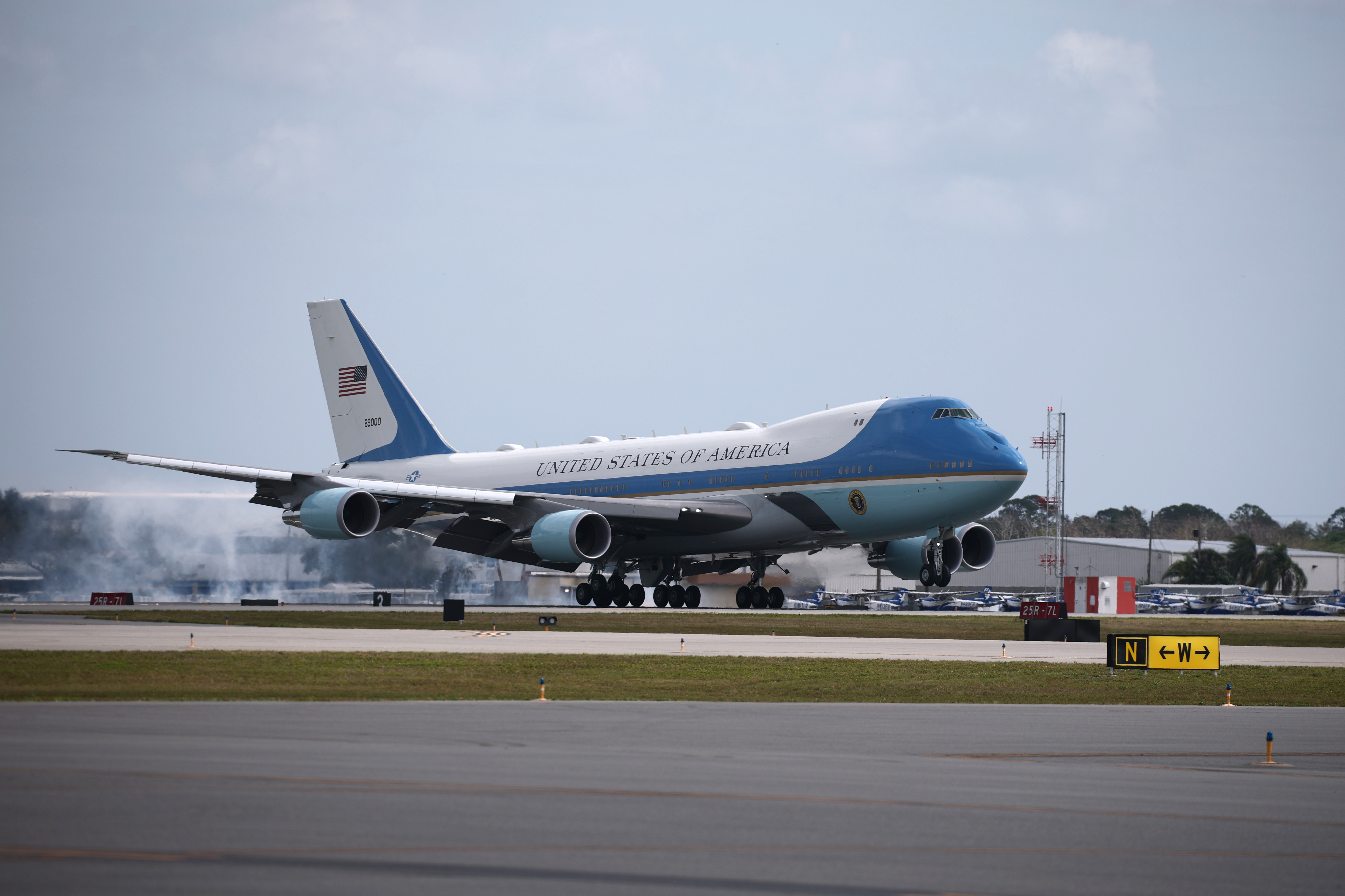 DAYTONA BEACH, FLORIDA - FEBRUARY 16: Air Force One is seen landing for U.S. President Donald Trump's visit to the NASCAR Cup Series Daytona 500 at Daytona International Speedway on February 16, 2025 in Daytona Beach, Florida. (Photo by Chris Graythen/Getty Images)