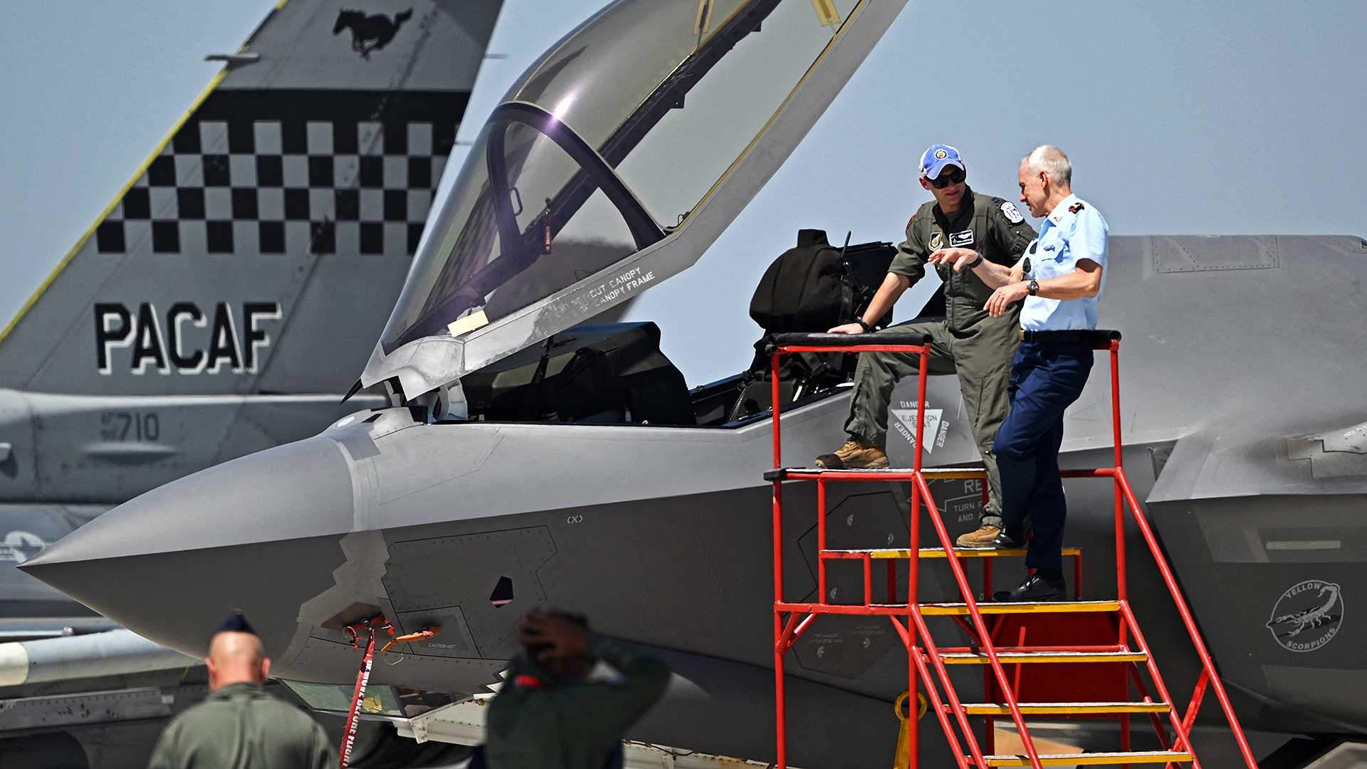 Military personnel inspect the U.S. Air Force's F-35 fifth-generation fighter aircraft during Aero India 2025, a military aviation exhibition at the Yelahanka Air Force Station in Bengaluru on February 12, 2025. (Photo by Idrees MOHAMMED / AFP) (Photo by IDREES MOHAMMED/AFP via Getty Images)
