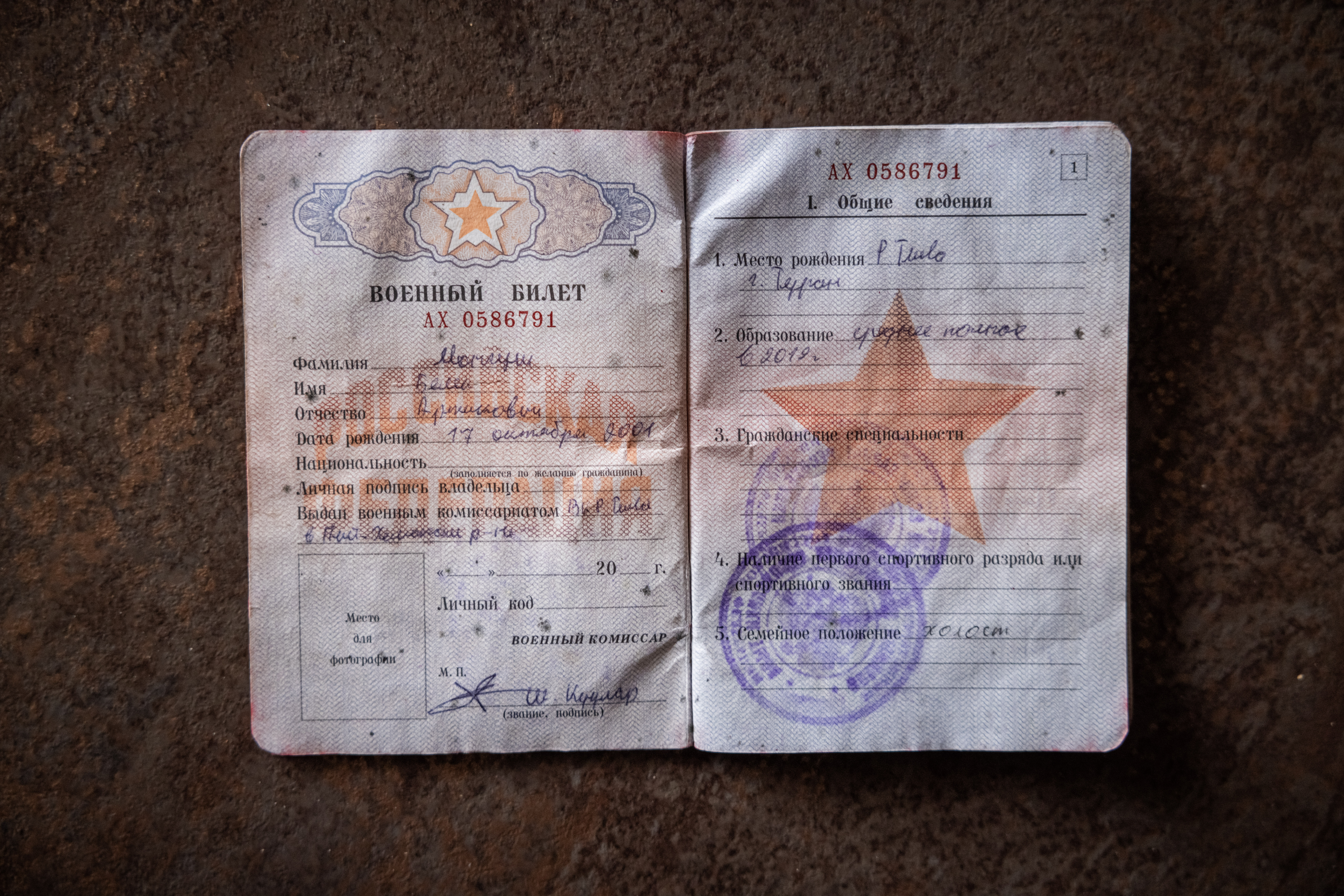SUMY, UKRAINE - JANUARY 14: A Russian military ID found on a North Korean assaulting soldier in Russia's Kursk Region, is placed on a table to be photographed, at a military base belonging to soldiers from Ukraine's 8th Special Operations Forces Regiment, 1st Battalion, on January 14th 2025, in Sumy Region, Ukraine. Ukrainian troops said the data inside often appears to be falsified or incomplete. Ukrainian troops say that have been fighting North Korean troops in Russia's Kursk Region where Ukraine has held territory since August 2024. (Photos by Ed Ram/For The Washington Post via Getty Images)