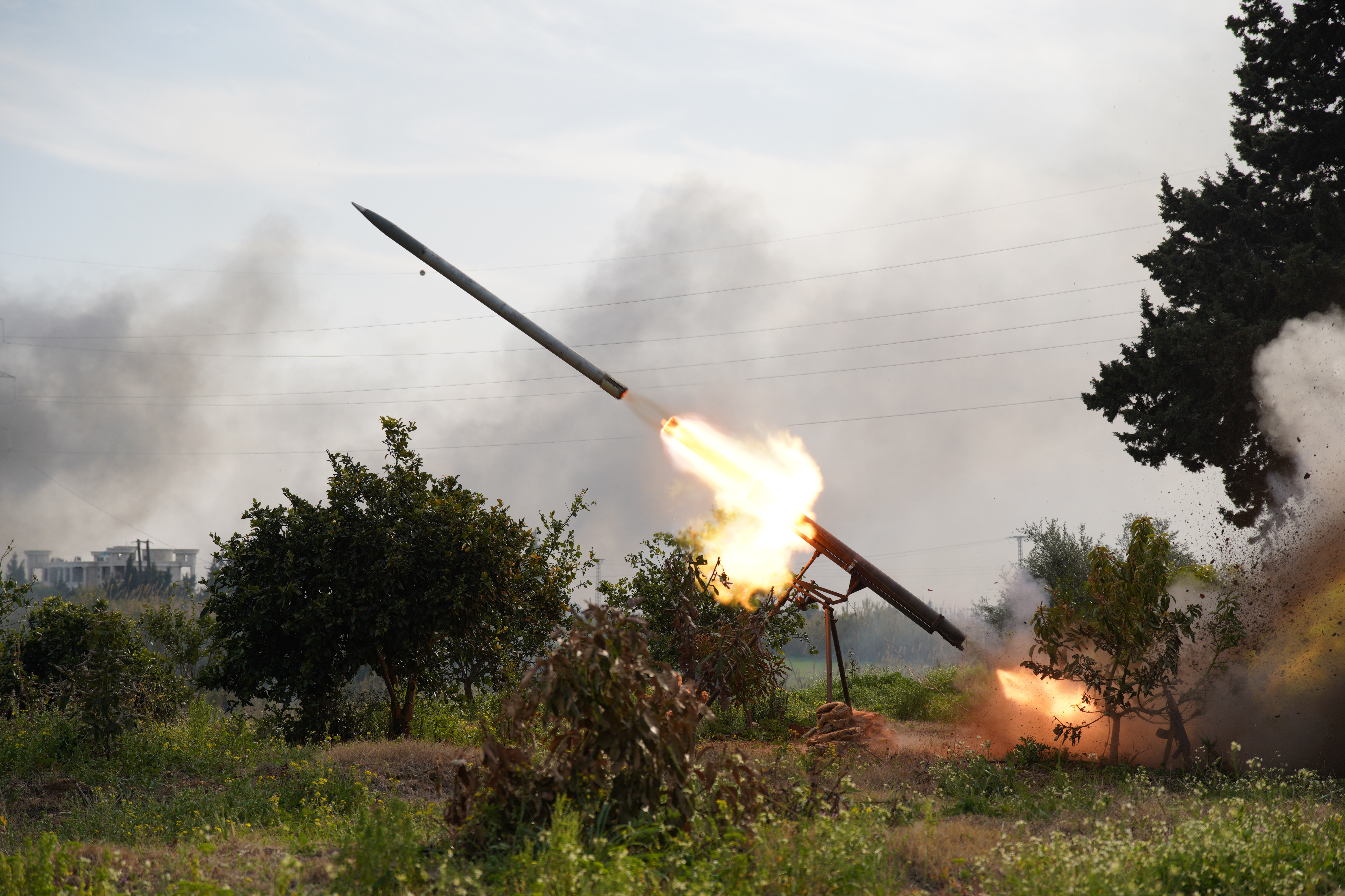 LATAKIA, SYRIA - MARCH 07: A rocket is seen being fired as authorities extended the curfew in the cities of Latakia and Tartus in northwest Syria on Friday and launched large-scale security sweeps in urban centers, villages, and surrounding mountains to track down remnants of the deposed Bashar al-Assad regime on March 07, 2025 in Latakia, Syria. This decision was made in response to recent security tensions in the coastal region, which saw former regime elements attack security patrols and checkpoints, resulting in casualties. (Photo by Abdulvacit Haci Isteyfi/Anadolu via Getty Images)