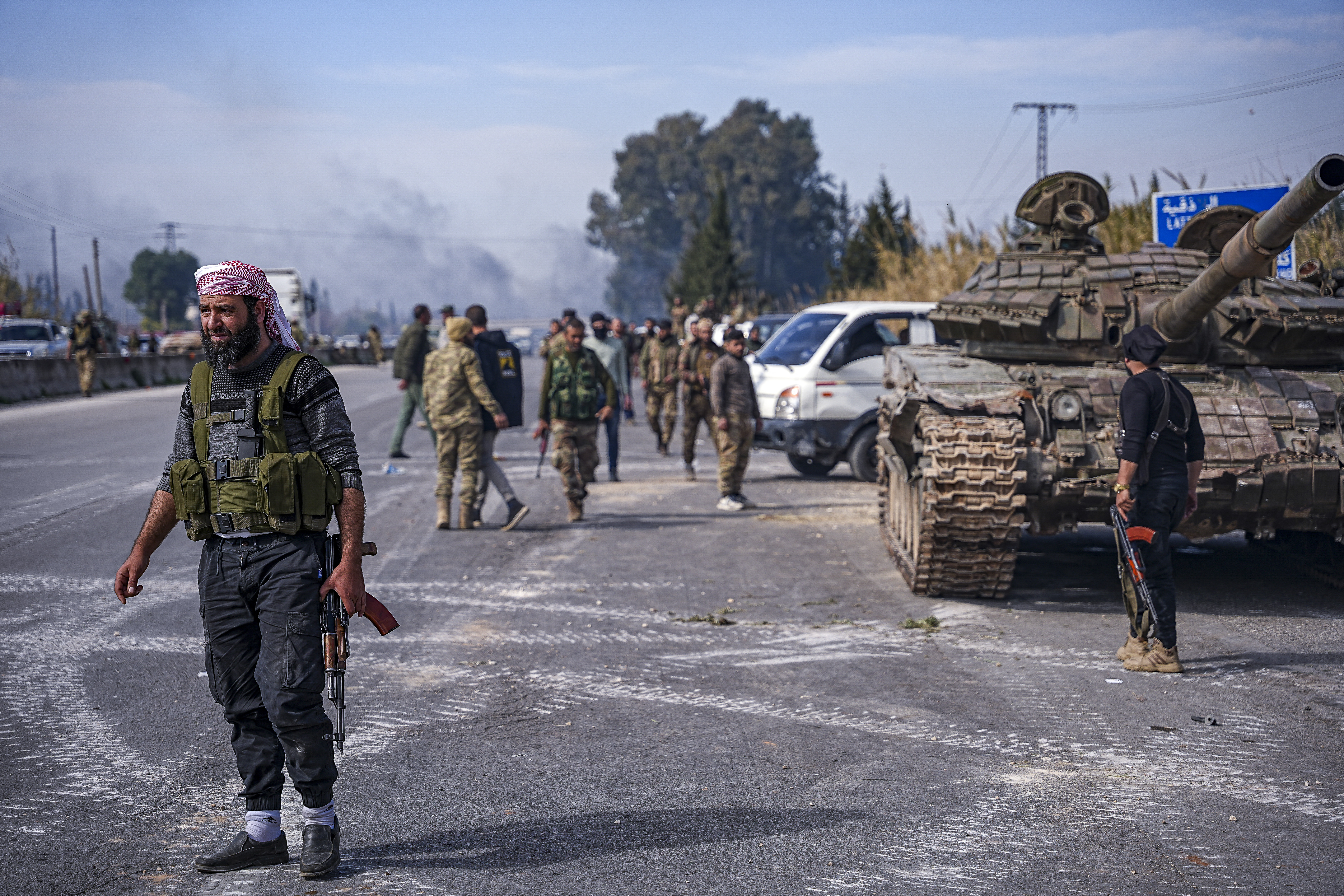 Battles take place between the new Syrian government's Defense Ministry forces and the forces loyal to Bashar Assad on March 7, 2025, in outskirts of Jableh, Latakia countryside, Syria. (Photo by Mohamad Daboul / Middle East Images / Middle East Images via AFP) (Photo by MOHAMAD DABOUL/Middle East Images/AFP via Getty Images)