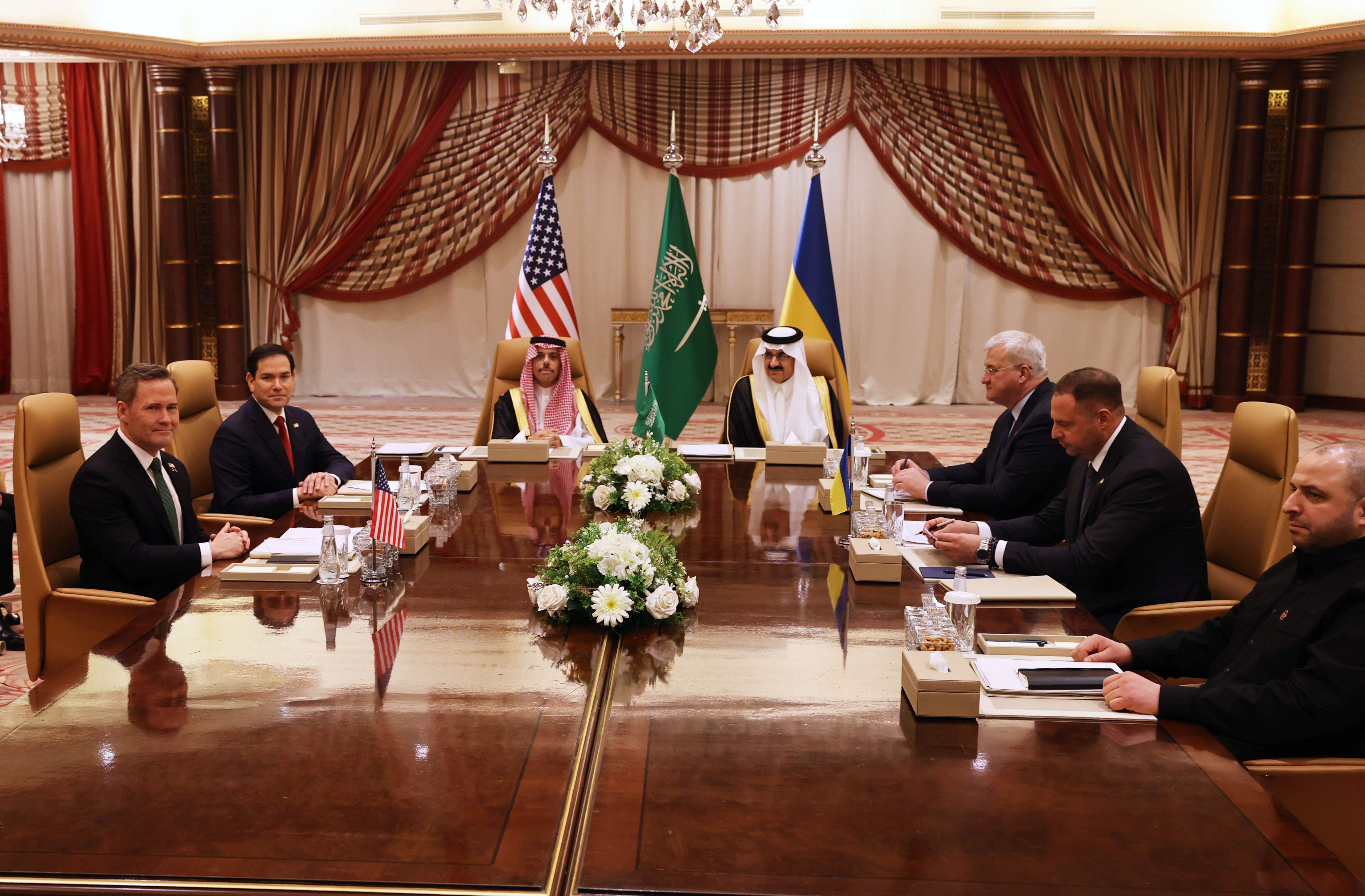 JEDDAH, SAUDI ARABIA - MARCH 11: (L-R) U.S. National Security Advisor Mike Waltz, U.S. Secretary of State Marco Rubio, Saudi Foreign Minister Faisal bin Farhan and National Security Advisor Mosaad bin Mohammad al-Aiban, Ukrainian Foreign Minister Andrii Sybiha, Ukrainian Head of Presidential Office Andriy Yermak and Ukrainian Minister of Defense Rustem Umerovto attend a meeting between the US and Ukraine hosted by the Saudis on March 11, 2025 in Jeddah, Saudi Arabia. An American delegation led by US Secretary of State Marco Rubio is in Jeddah to attend a high-stakes meeting with Ukrainian officials, in efforts to lay the groundwork for peace negations to end Russia's war in Ukraine. The talks come after Zelensky met with Saudi Crown Prince Mohammed bin Salman on Monday, and in the wake of a recent rift in US-Ukraine relations. (Photo by Salah Malkawi/Getty Images)