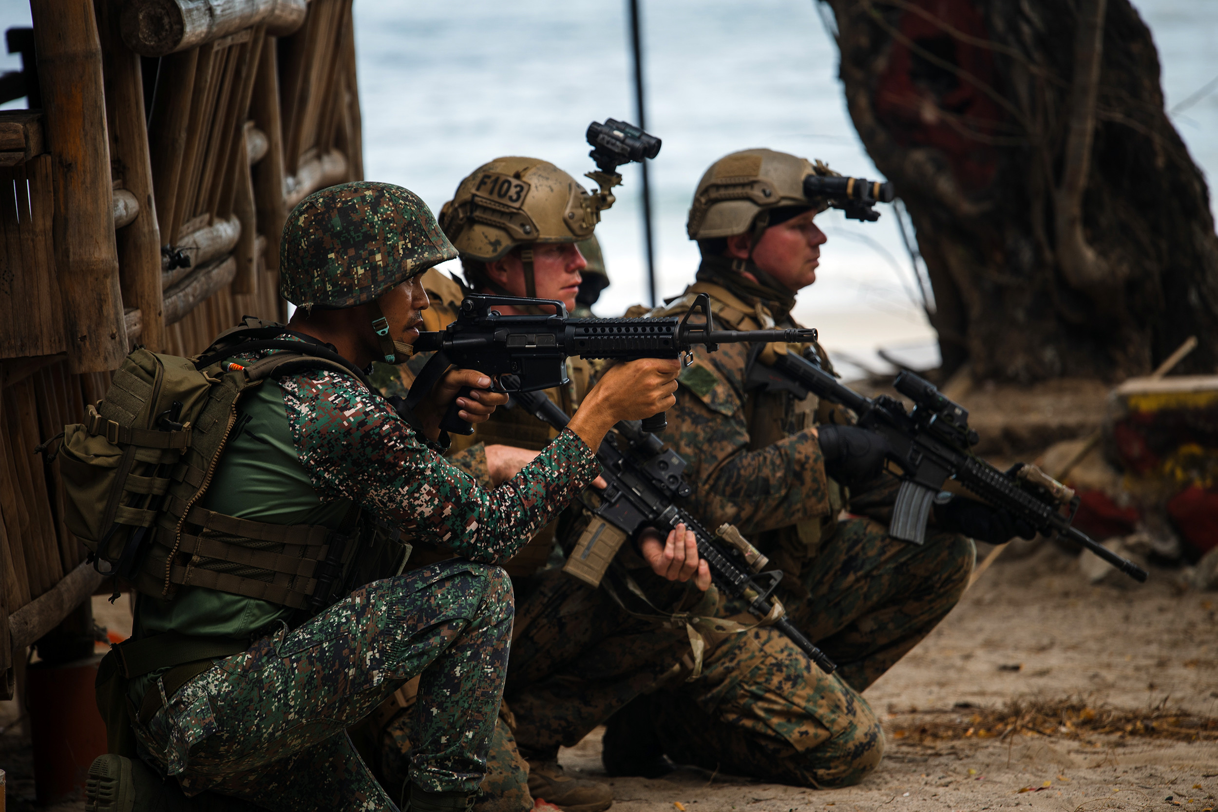 U.S. Marines with 3d Reconnaissance Battalion, 3d Marine Division, and Philippine Marines with Force Reconnaissance Group, conduct a raid rehearsal during Balikatan 22 at Marine Barracks Gregorio Lim, Cavite, Philippines, March 30, 2022. Balikatan is an annual exercise between the Armed Forces of the Philippines and U.S. military designed to strengthen bilateral interoperability, capabilities, trust, and cooperation built over decades of shared experiences. Balikatan, Tagalog for ‘shoulder-to-shoulder,’ is a long-standing bilateral exercise between the Philippines and the United States highlighting the deep-rooted partnership between both countries. BK22 is the 37th iteration of the exercise and coincides with the 75th anniversary of U.S.-Philippine security cooperation. (U.S. Marine Corps photo by Cpl. Jackson Dukes)