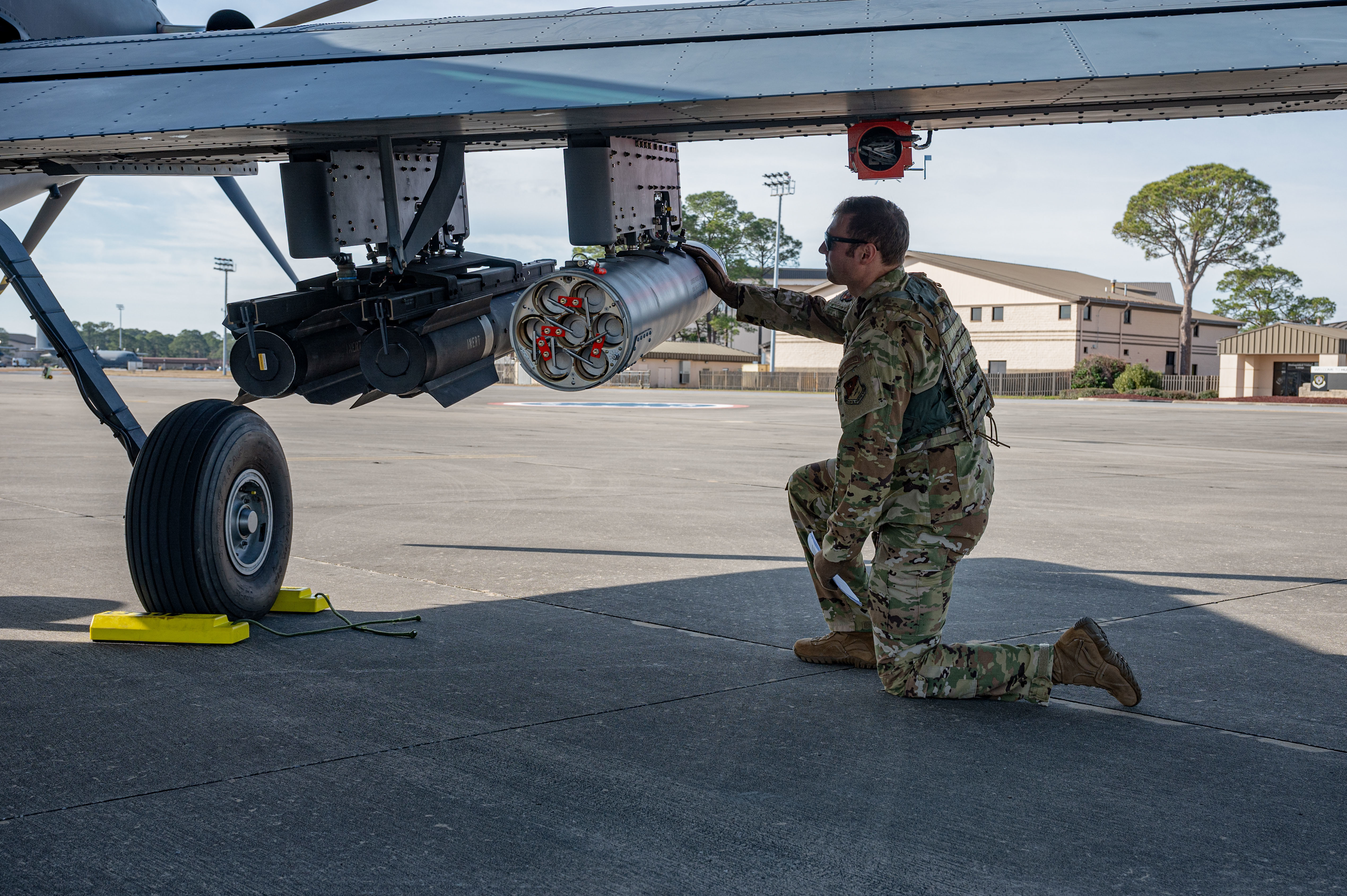 An OA-1K Skyraider II pilot conducts a walkaround on the flightline at Hurlburt Field, Florida, Jan. 28, 2025. The OA-1K Skyraider II will deliver close air support, precision strike, and armed intelligence, surveillance and reconnaissance capabilities. (U.S. Air Force photo by Staff Sgt. Natalie Fiorilli)
