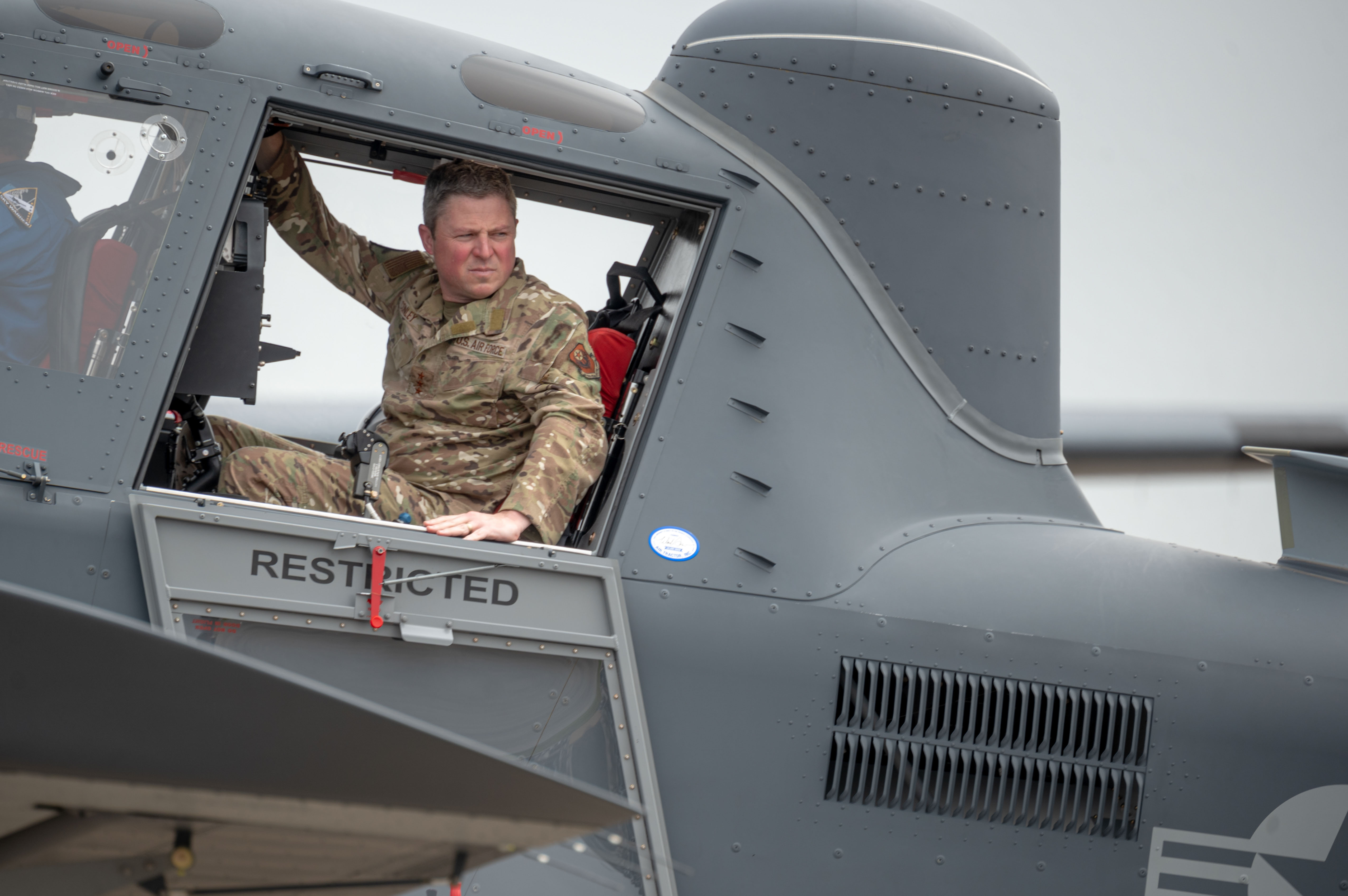 U.S. Air Force Lt. Gen. Michael Conley, Air Force Special Operations Command commander, steps from the OA-1K Skyraider II as part of a delivery ceremony at Hurlburt Field, Florida, April 3, 2025. The ceremony recognized the delivery of the first missionized OA-1K Skyraider II to AFSOC. (U.S. Air Force photo by Staff Sgt. Natalie Fiorilli)