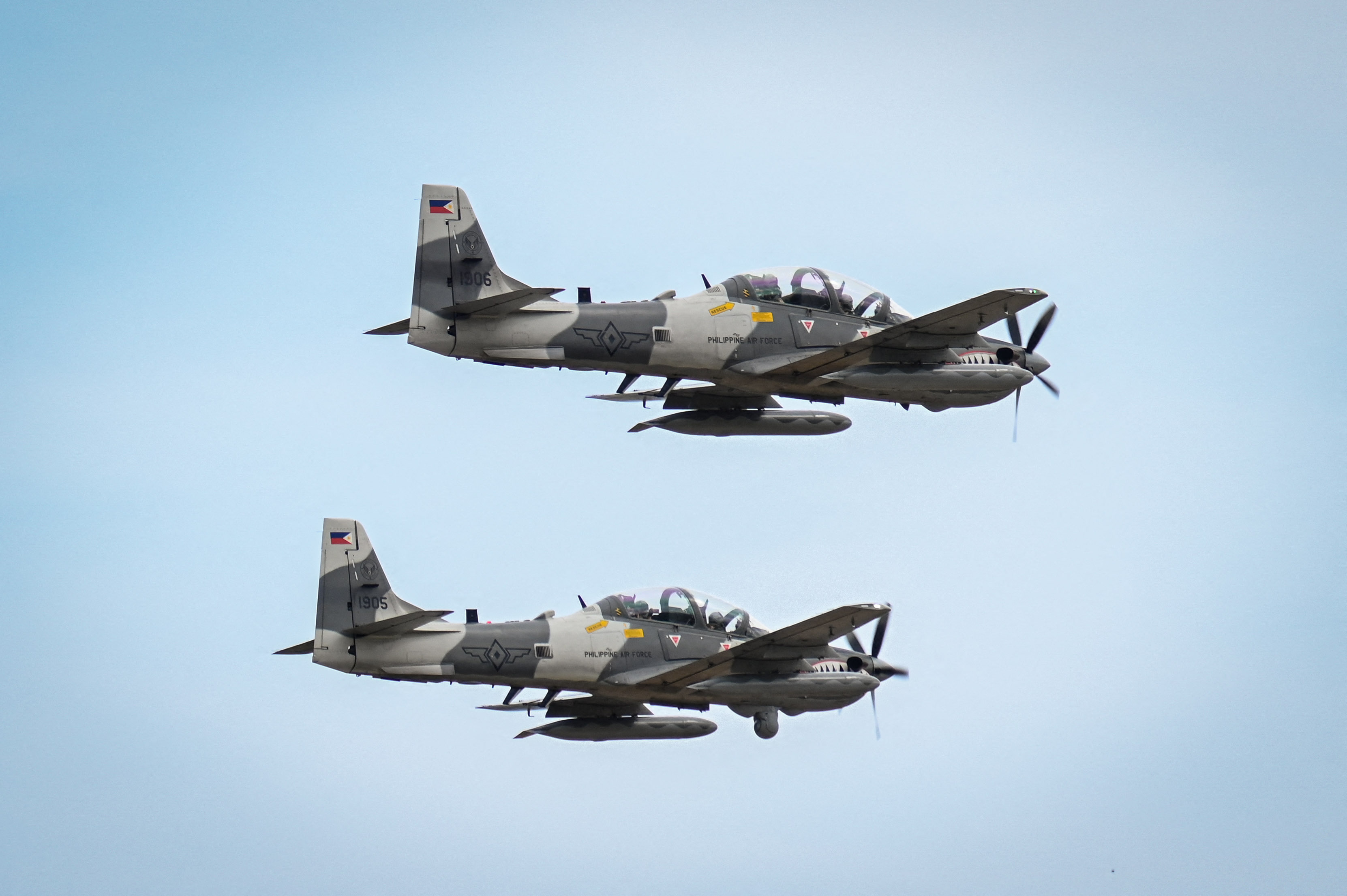Philippine Air Force Super Tucano light attack aircraft fly by during an airfield seizure exercise as part of the US-Philippines Balikatan joint military exercise at San Vicente Airport in Palawan on May 1, 2024. (Photo by JAM STA ROSA / AFP) (Photo by JAM STA ROSA/AFP via Getty Images)