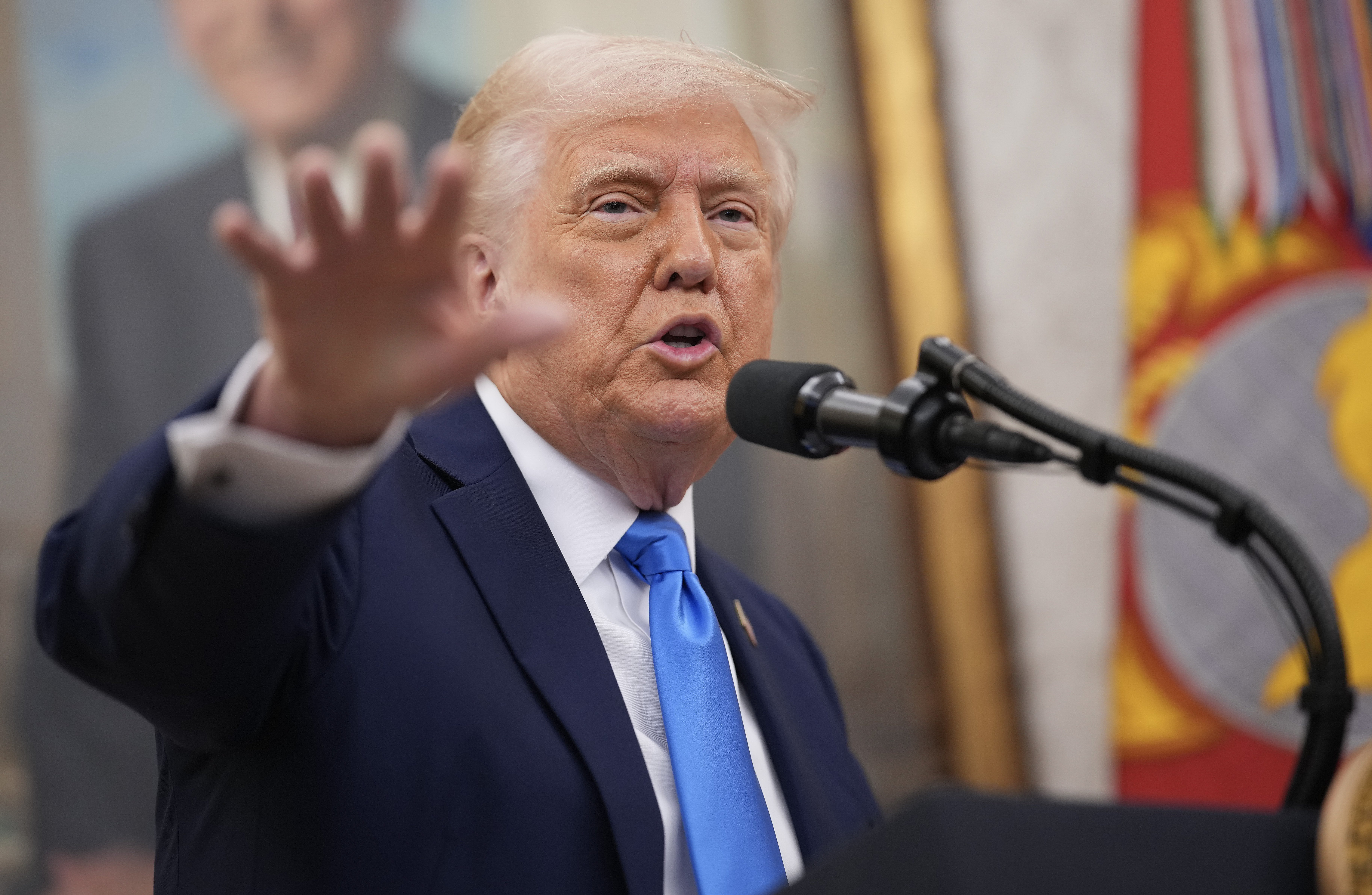 WASHINGTON, DC - MARCH 28: U.S. President Donald Trump announces that his administration has reached a deal with elite law firm Skadden, Arps, Slate, Meagher & Flom during a swearing-in ceremony in the Oval Office at the White House on March 28, 2025 in Washington, DC. Trump will host the swearing in of his former personal attorney and White House Presidential counselor Alina Habba as interim U.S. Attorney in New Jersey. (Photo by Andrew Harnik/Getty Images)