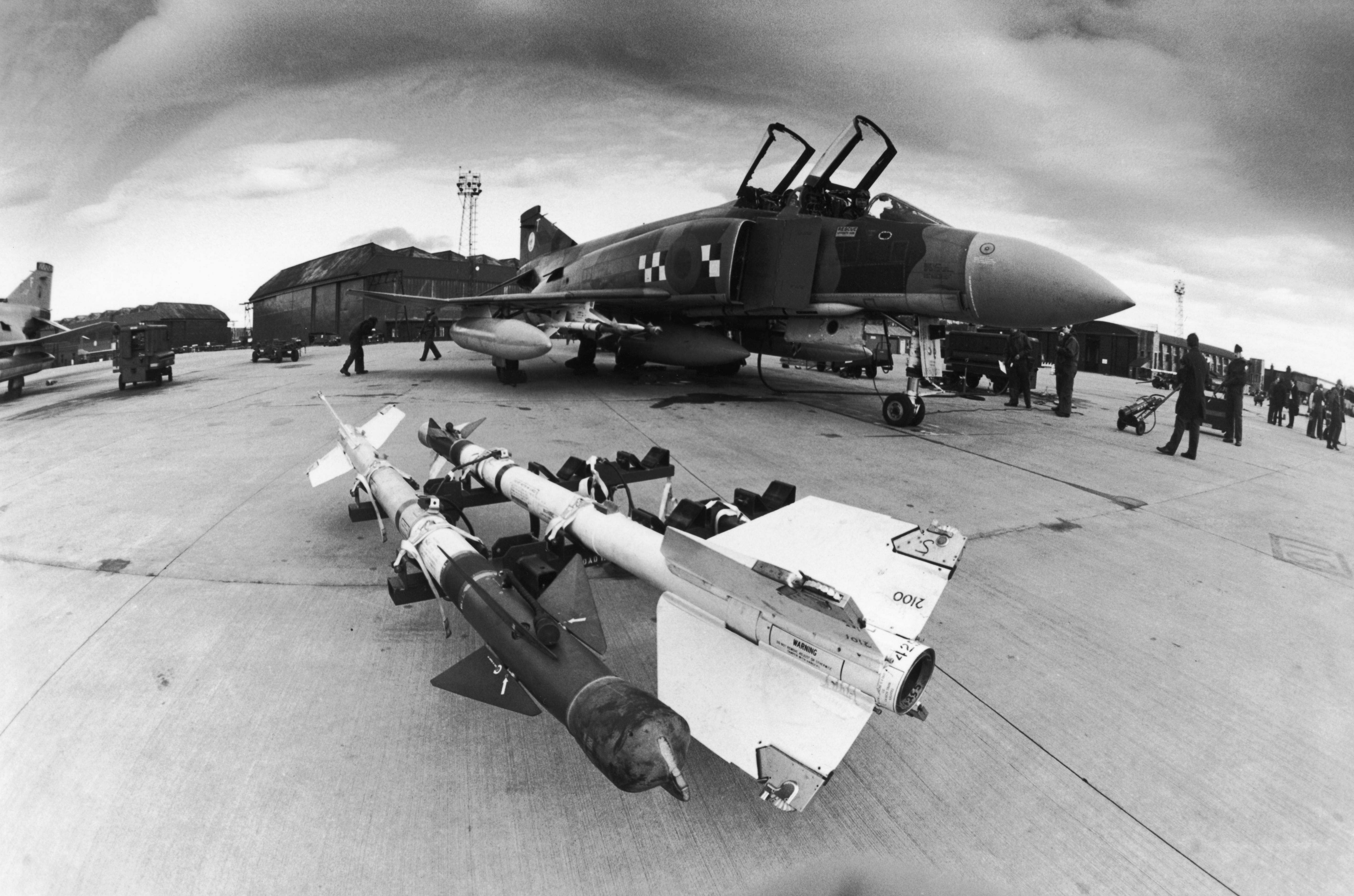 Sidewinder air-to-air missiles ready to be mounted on a McDonnell Douglas F-4 Phantom of the RAF during a British nationwide alert exercise, 5th-7th March 1984. (Photo by Tom Stoddart/Getty Images)