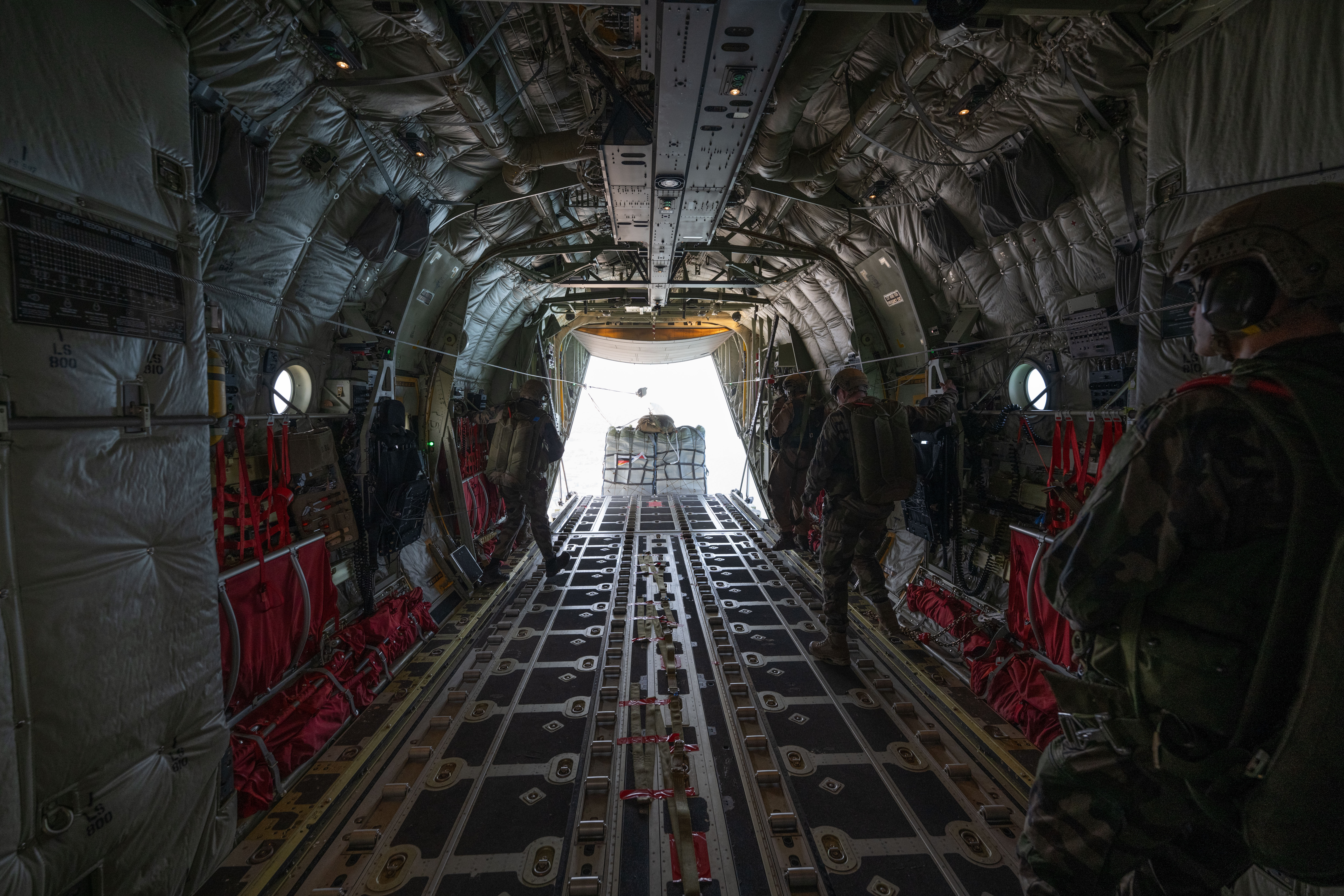 25 March 2024, Palestinian Territories, Gaza: A pallet of food is dropped from a C-130 Hercules transport plane of the German Air Force over the Gaza Strip. The German Armed Forces are participating with other nations in aid flights in which the relief supplies are dropped from transport aircraft. Photo: Boris Roessler/dpa (Photo by Boris Roessler/picture alliance via Getty Images)